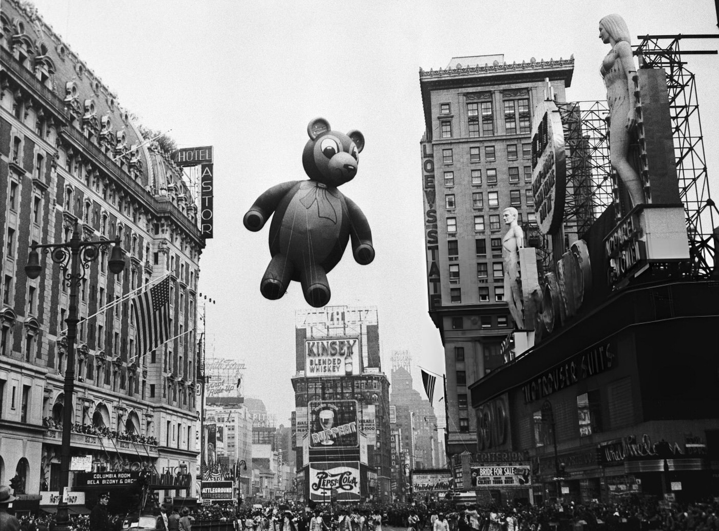 A Teddy Bear Balloon Looks Down On The Crowd During The Annual Macy'S Thanksgiving Parade In The Times Square Area.