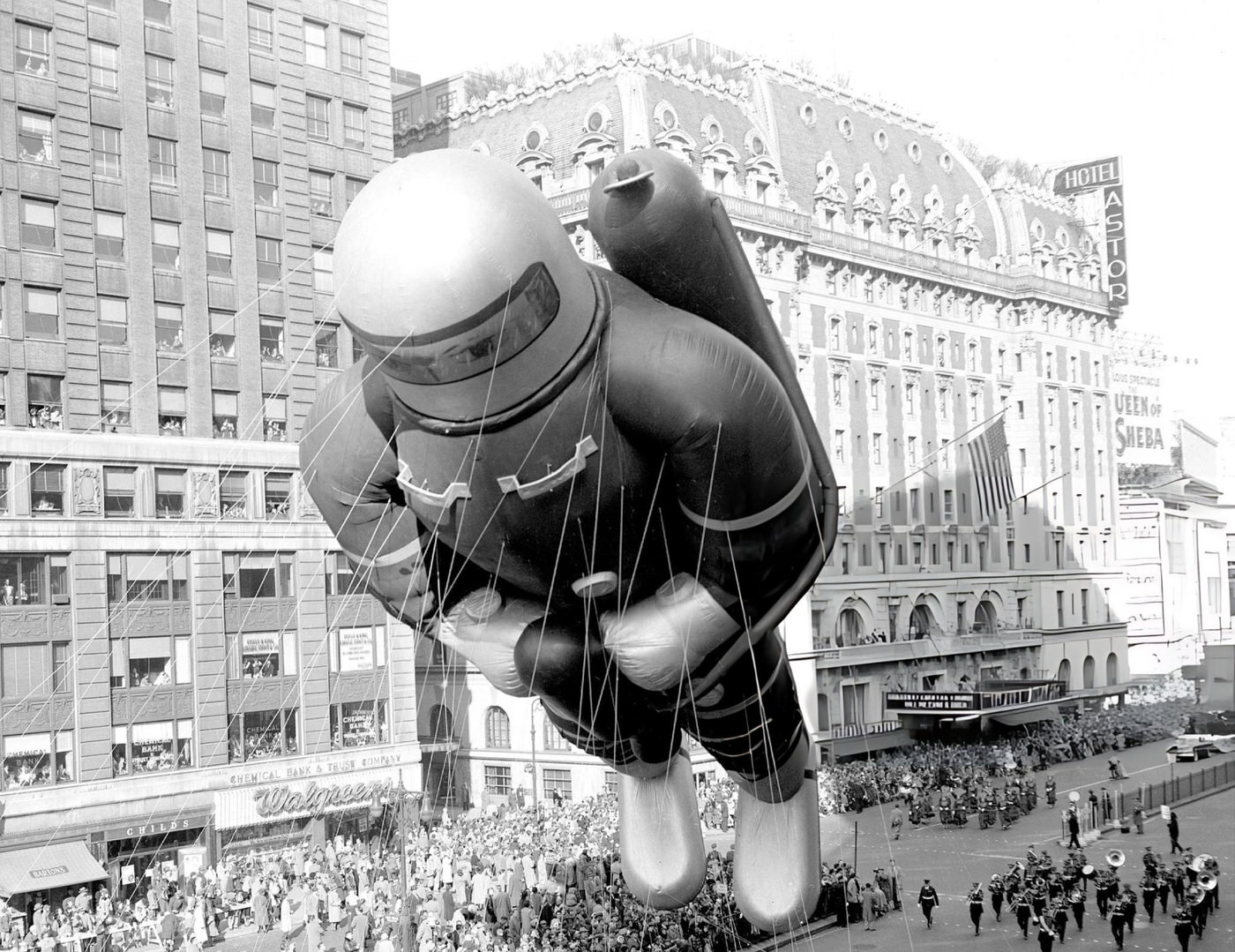 A 70-Foot-Tall Helium-Filled Rubber Spaceman Bobs Along In The 27Th Annual Macy'S Thanksgiving Day Parade, 1956.