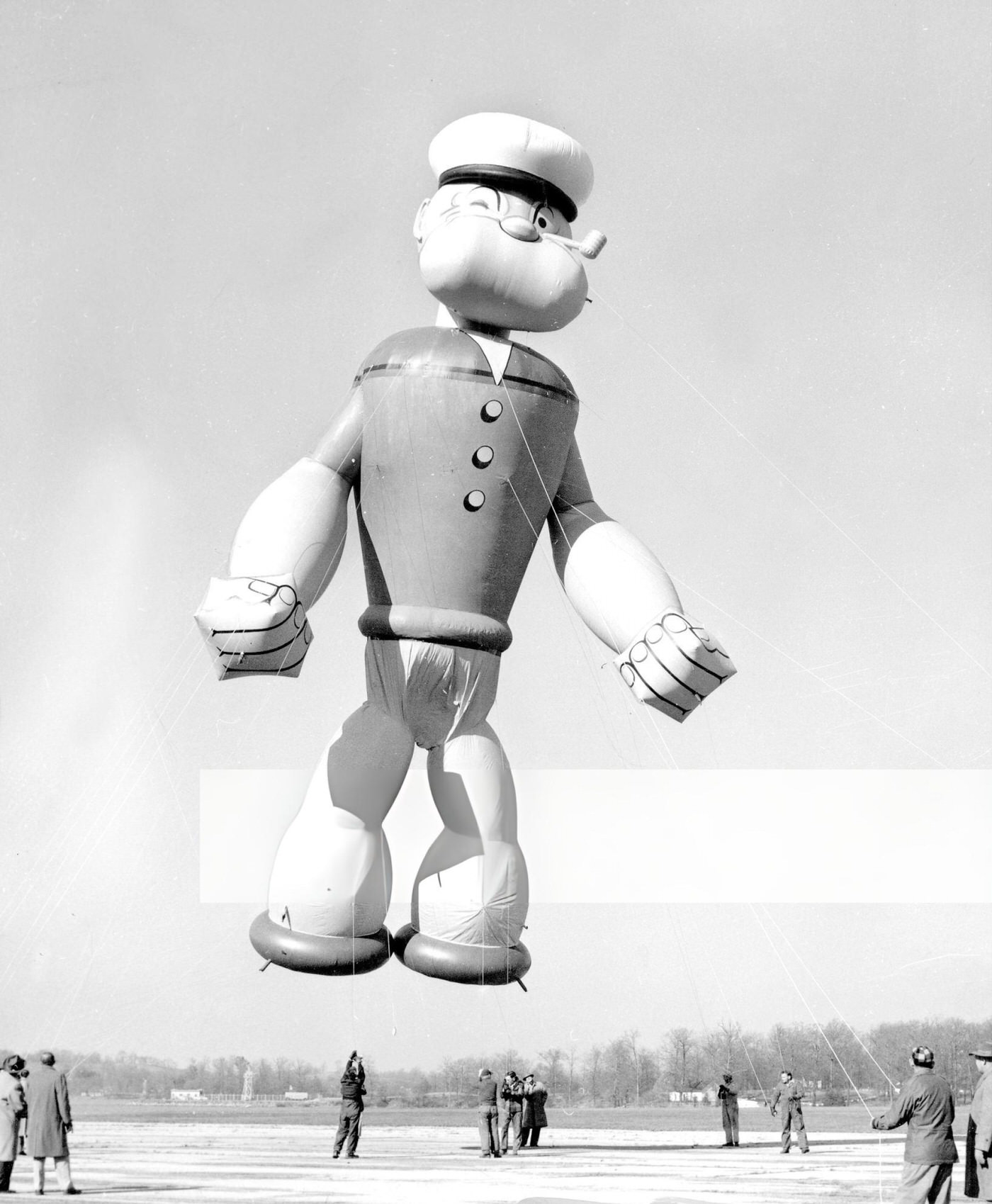 Popeye The Sailor Flexes His Muscles As He Prepares To Parade In Macy'S Thanksgiving Day Parade, 1956.