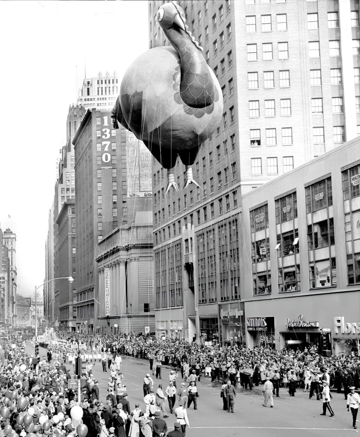 Ground Crew Struggles To Control A Giant Turkey Balloon During Macy'S Thanksgiving Day Parade, 1956.