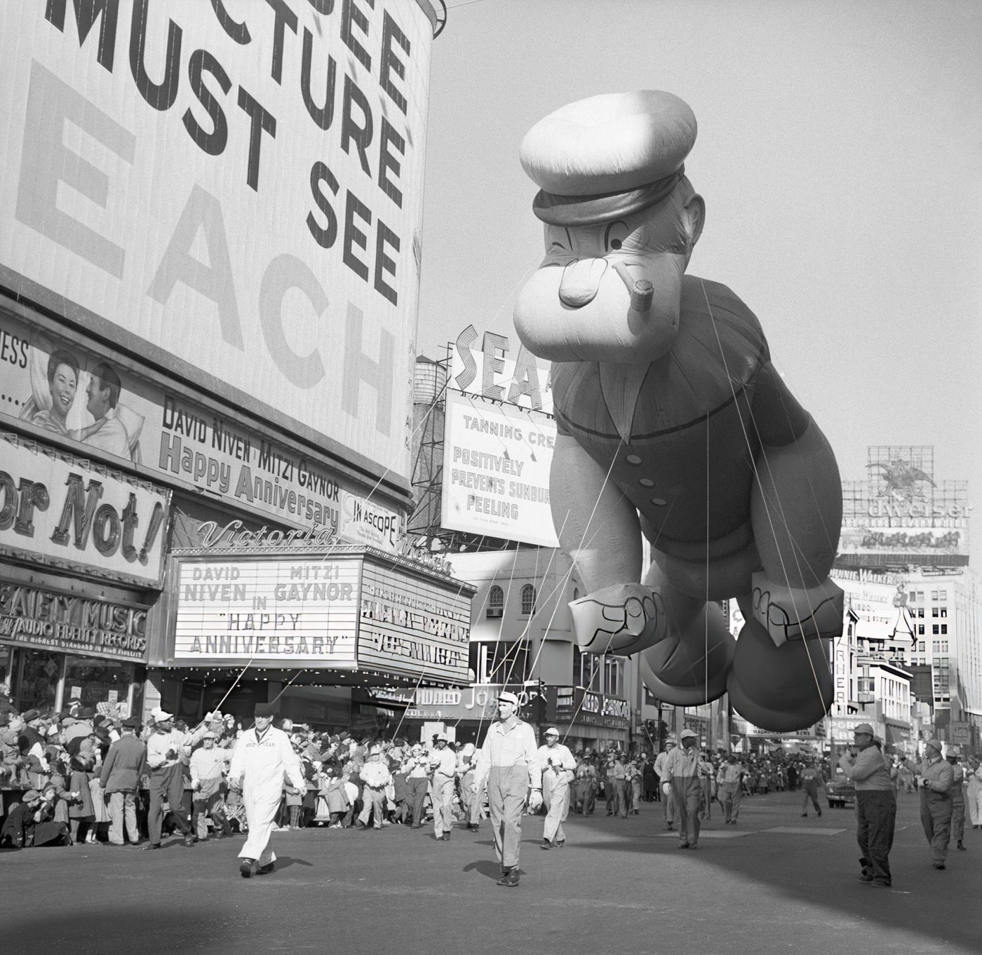 The Popeye Balloon, One Of The Huge Balloons In The Annual Macy'S Thanksgiving Day Parade, Makes Its Way Through Times Square, 1950S.