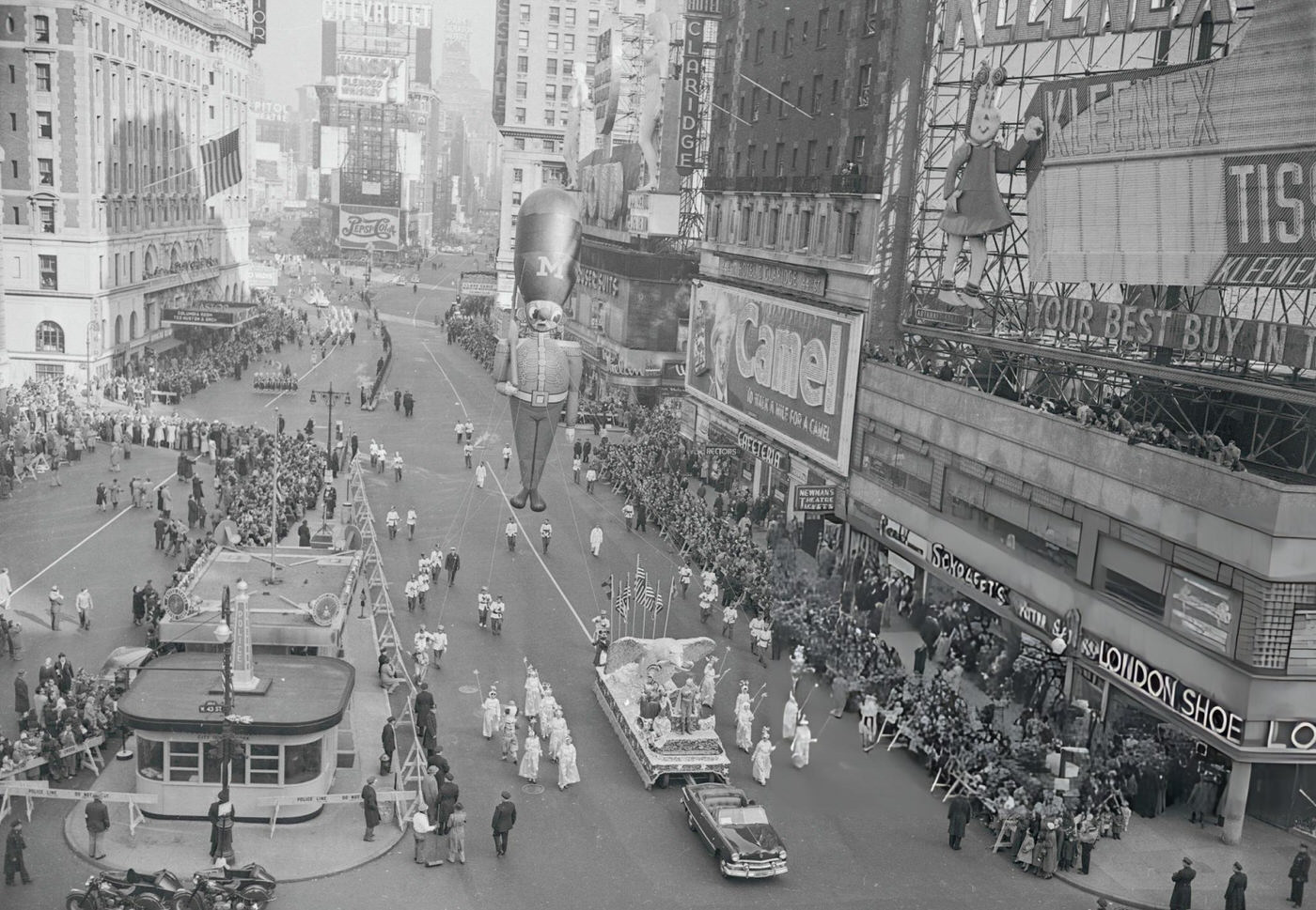 A Toy Soldier Balloon, Paced By A Float Bearing An American Eagle, Lords It Over Times Square During Macy'S Thanksgiving Day Parade, 1950S.