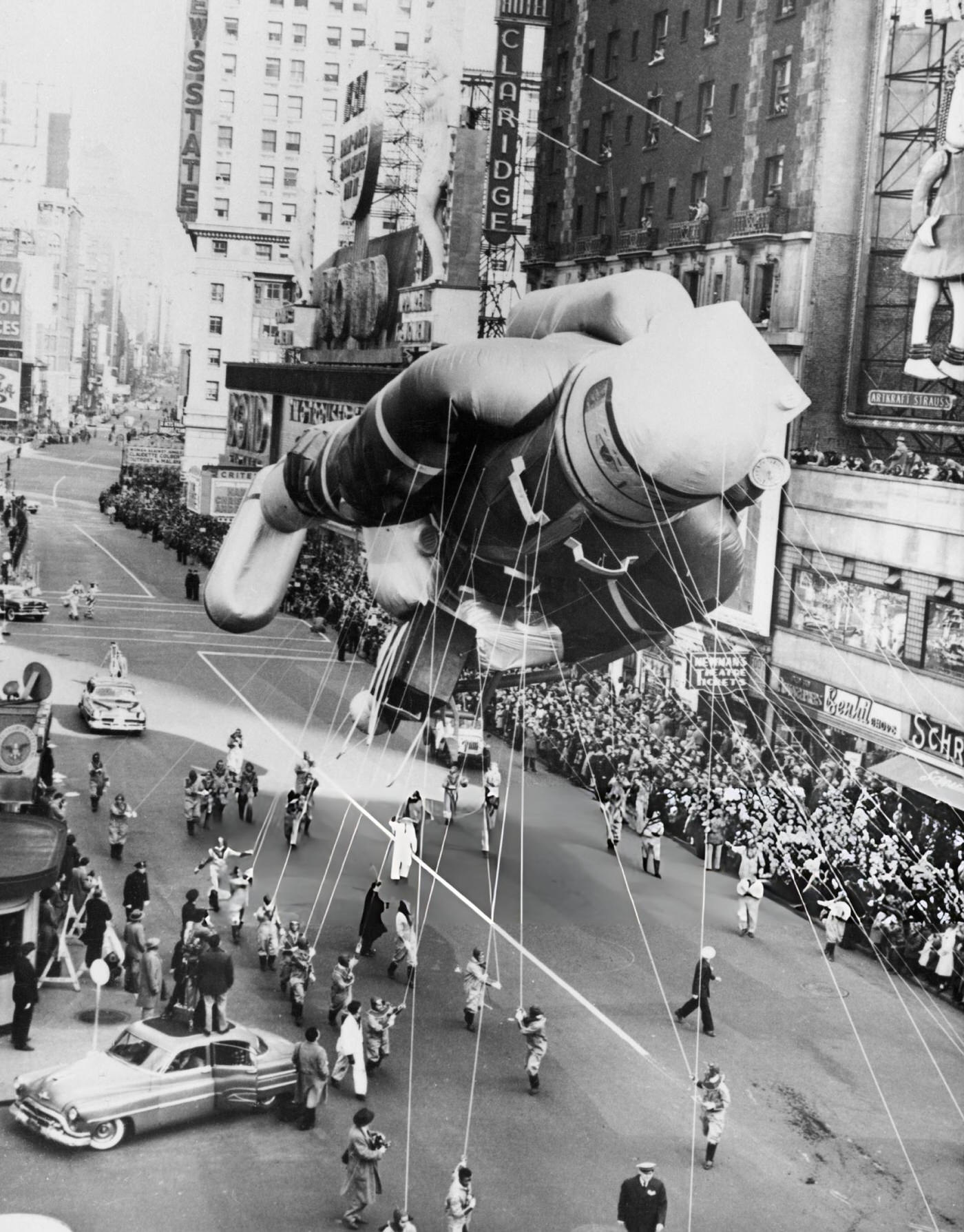A Helium-Filled Balloon Shaped Like An Astronaut Is Paraded During The Macy'S Thanksgiving Day Parade In New York City, 1952.