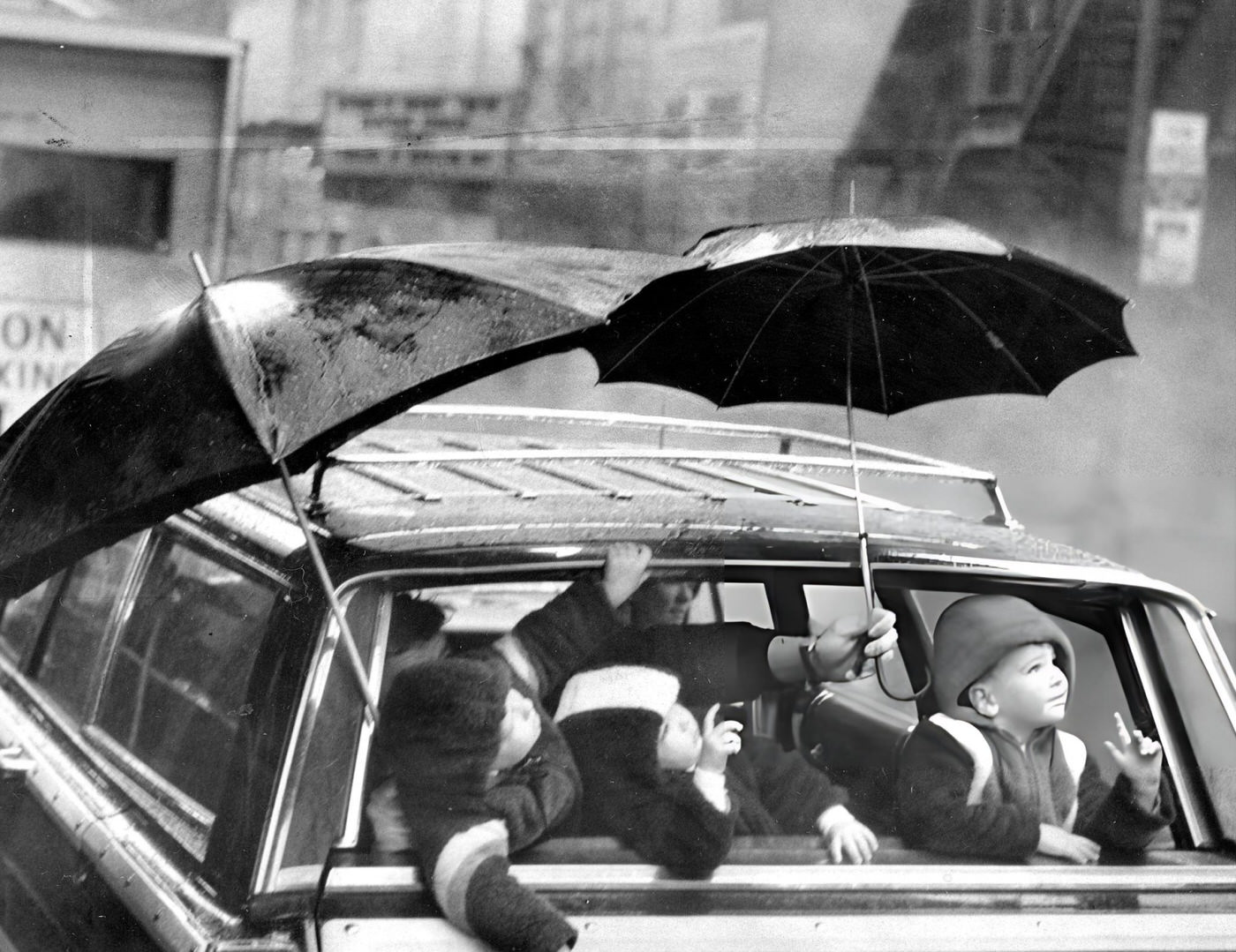Children Sit In Their Stationwagon At 45Th St. In Times Square To Watch Macy'S Thanksgiving Day Parade, 1963.