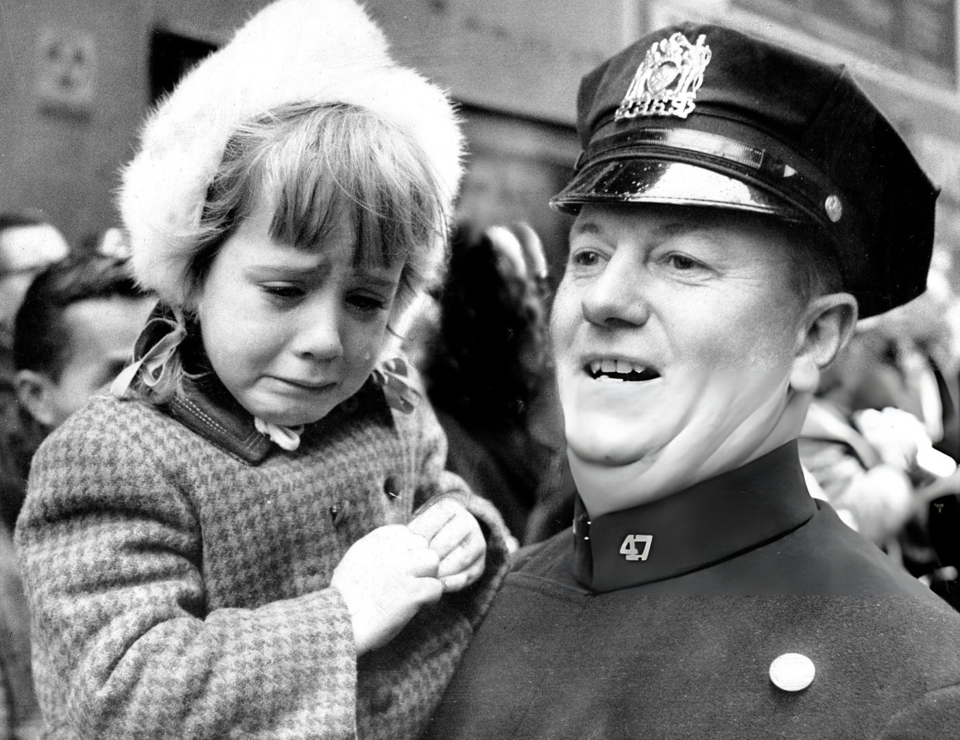 Little Miss Lost Gets Help From Patrolman Charles Furey Before Her Mother Claims Her At Macy'S Thanksgiving Day Parade, 1963.