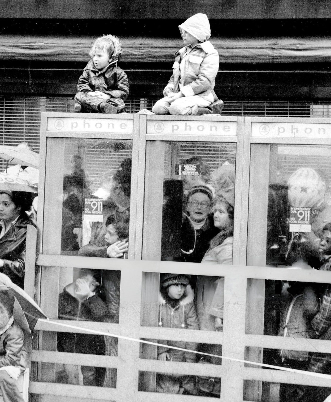 Children Watch Macy'S Thanksgiving Day Parade, Some Getting Out Of The Rain, 1972.