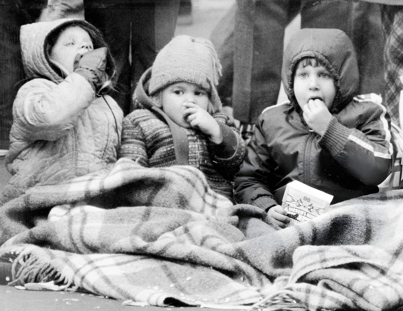 Three Children Use A Blanket To Ward Off Icy Blasts While Viewing Macy'S Thanksgiving Day Parade, 1972.