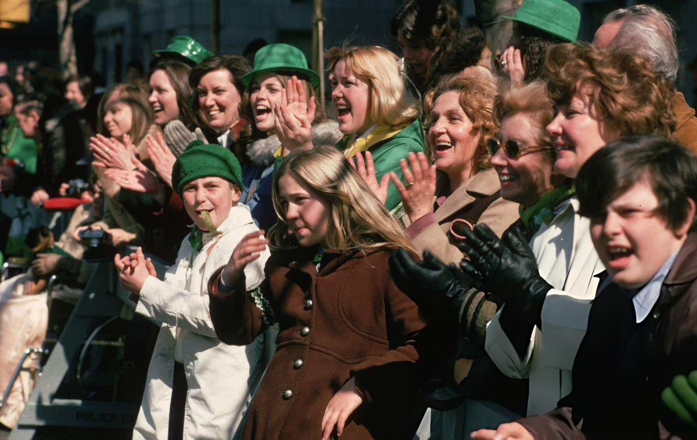 Part Of The Crowd Watching Macy'S Thanksgiving Day Parade, Some Of Whom Are Wearing Green Hats, Circa 1975.