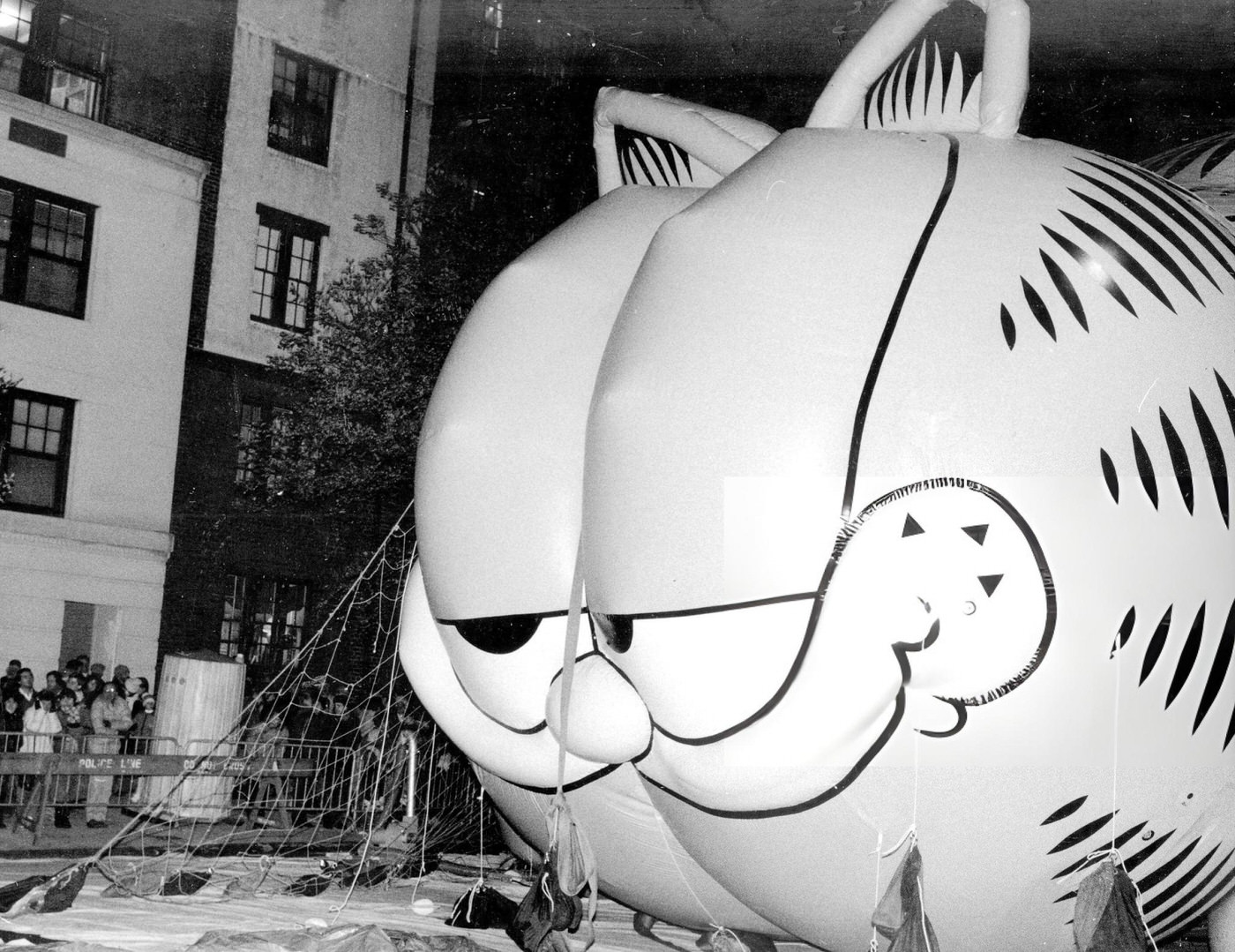 Garfield The Cat'S Grin Gets Wider As Technicians Pump Helium Into The Balloon Before The 58Th Annual Macy'S Thanksgiving Day Parade.