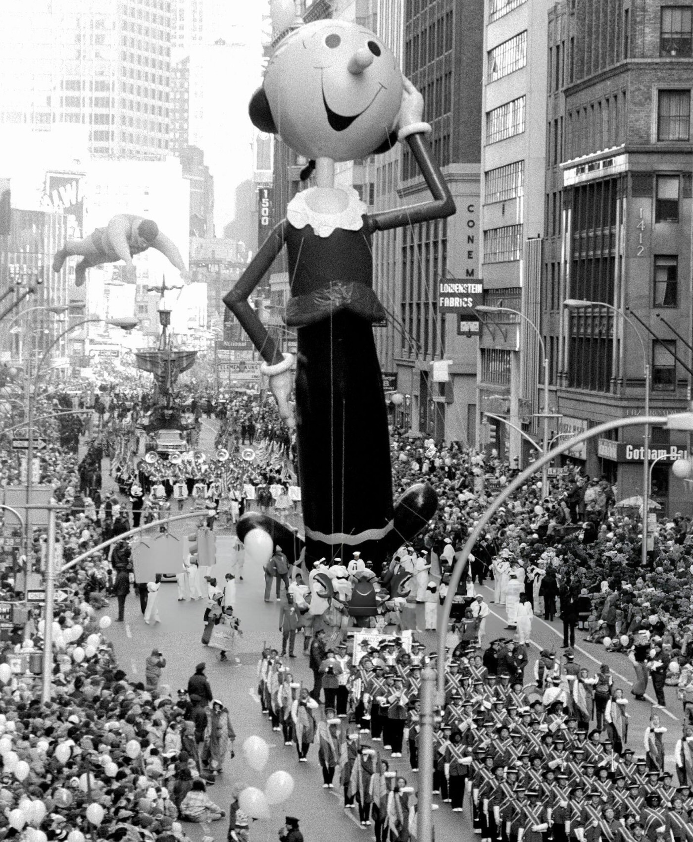 Olive Oyl, One Of The New Floats, Is Followed By The Favorite Superman Balloon At The Macy'S Thanksgiving Day Parade.