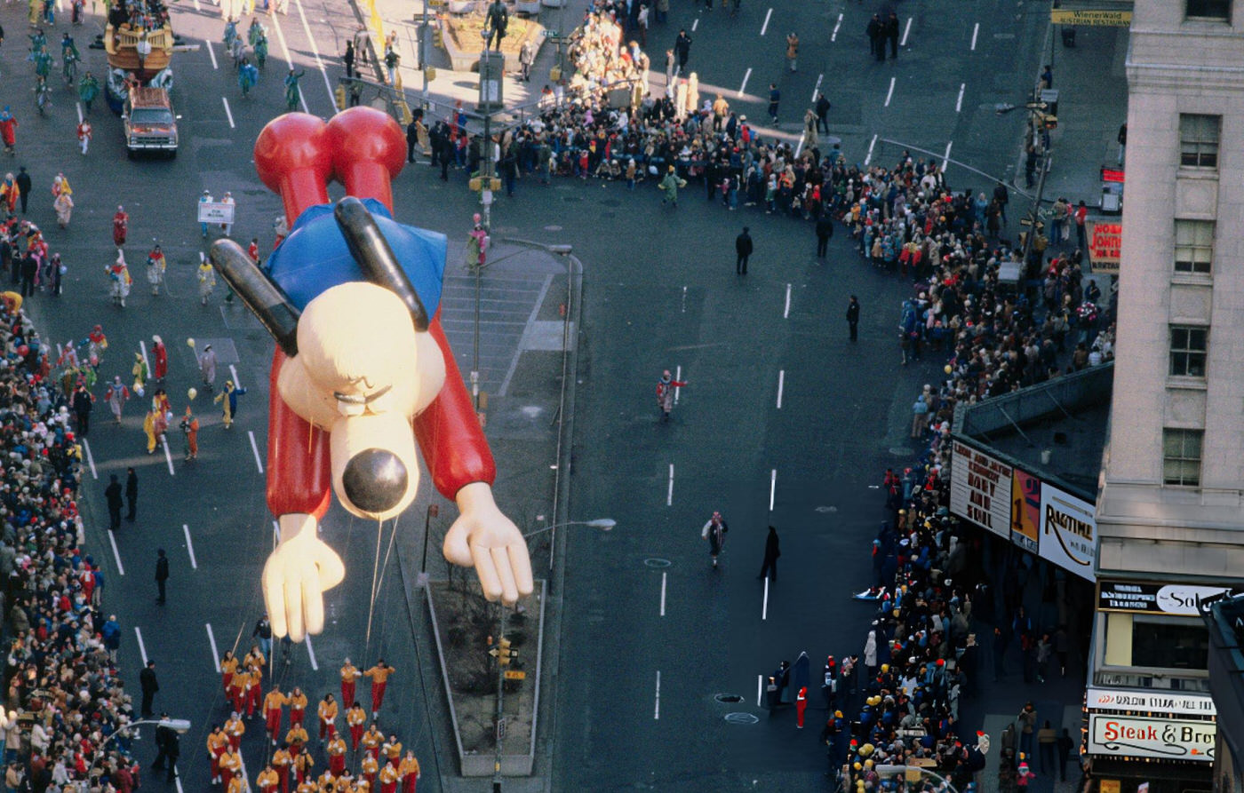 The Cartoon Character &Amp;Quot;Underdog&Amp;Quot; Balloon Hovers Over The Crowd During The Annual Thanksgiving Day Parade.