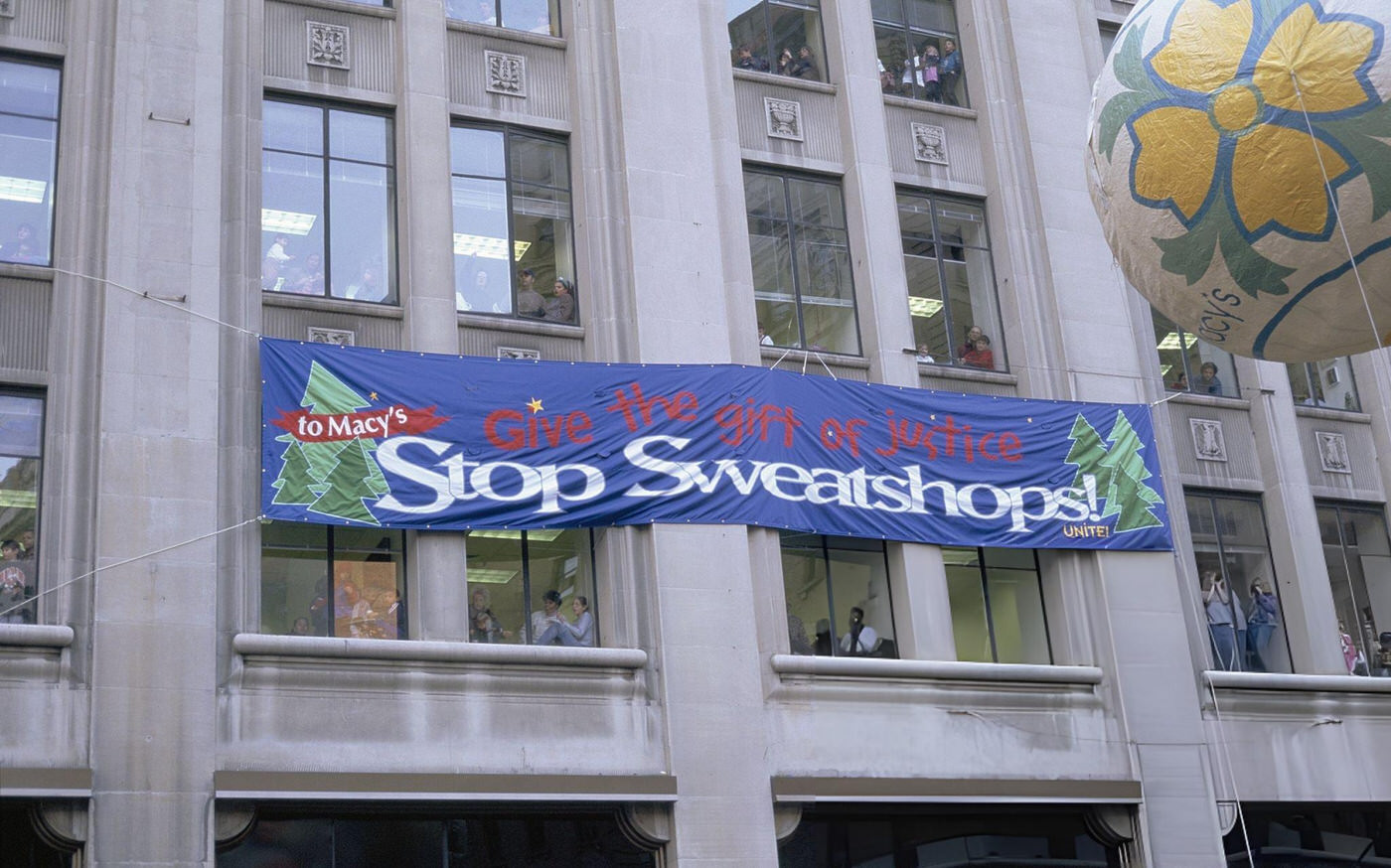 A Protest Sign During The 1996 Macy'S Thanksgiving Day Parade.