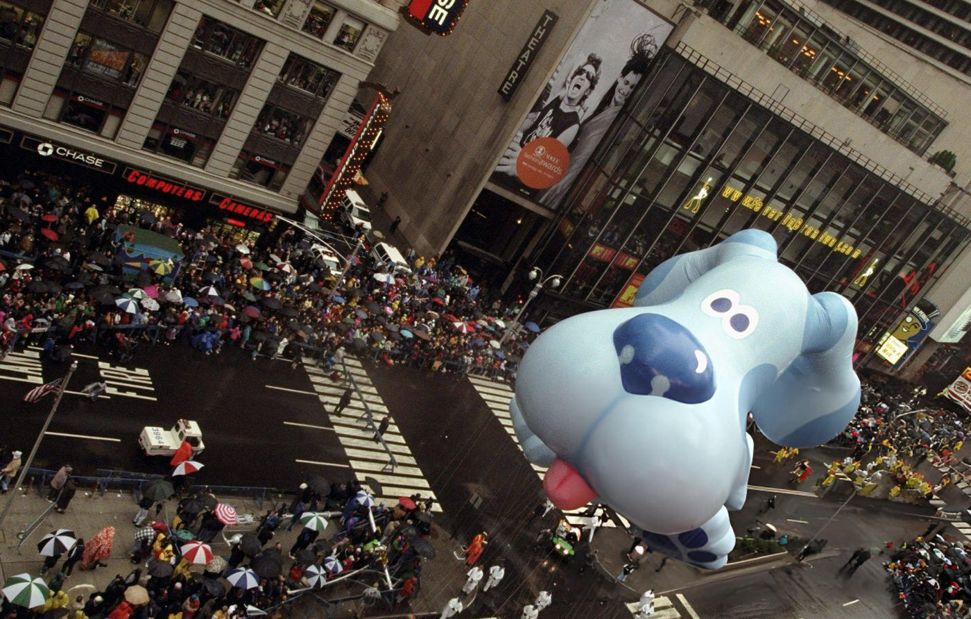 Blue The Dog Rides High Over Times Square During The 73Rd Annual Macy'S Thanksgiving Day Parade.