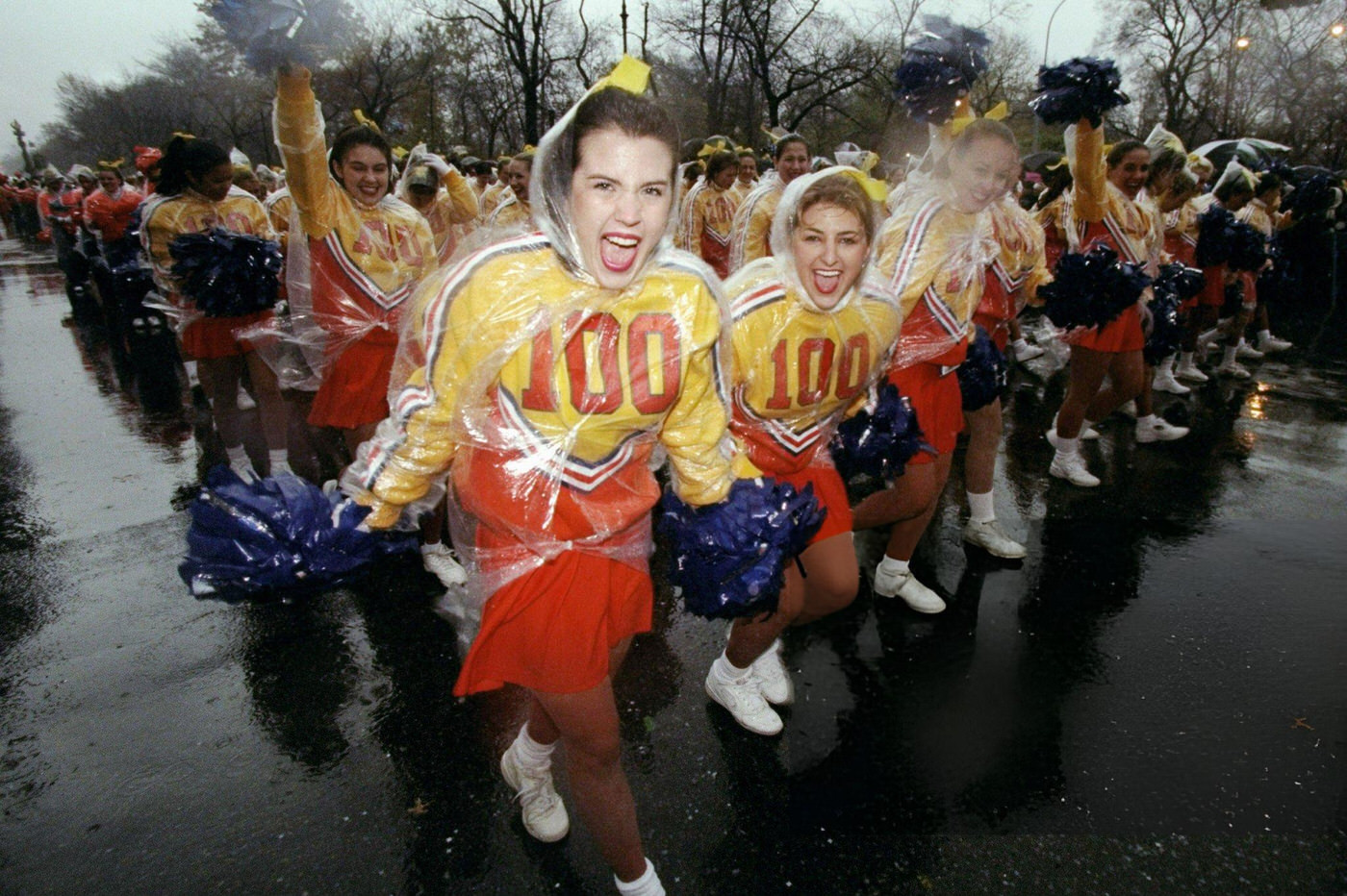 Cheerleaders Are Cheerful In Spite Of The Rainy Weather During The 72Nd Annual Macy'S Thanksgiving Day Parade.