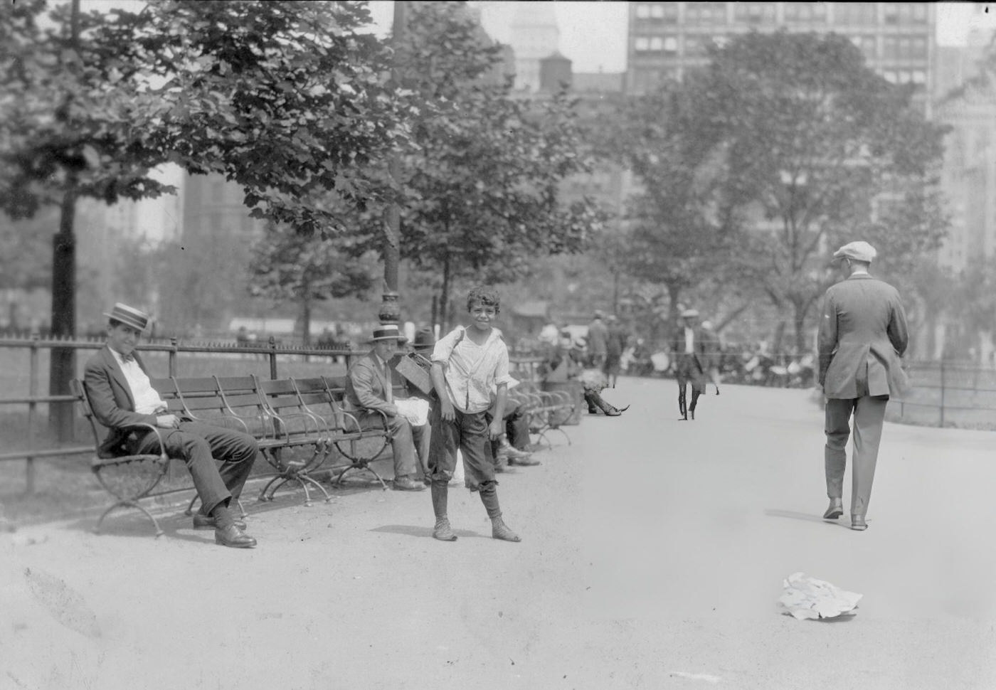 An Eleven-Year-Old Shoe Shiner Named Tony Poses On A Pathway In Union Square, New York, July 25, 1924.