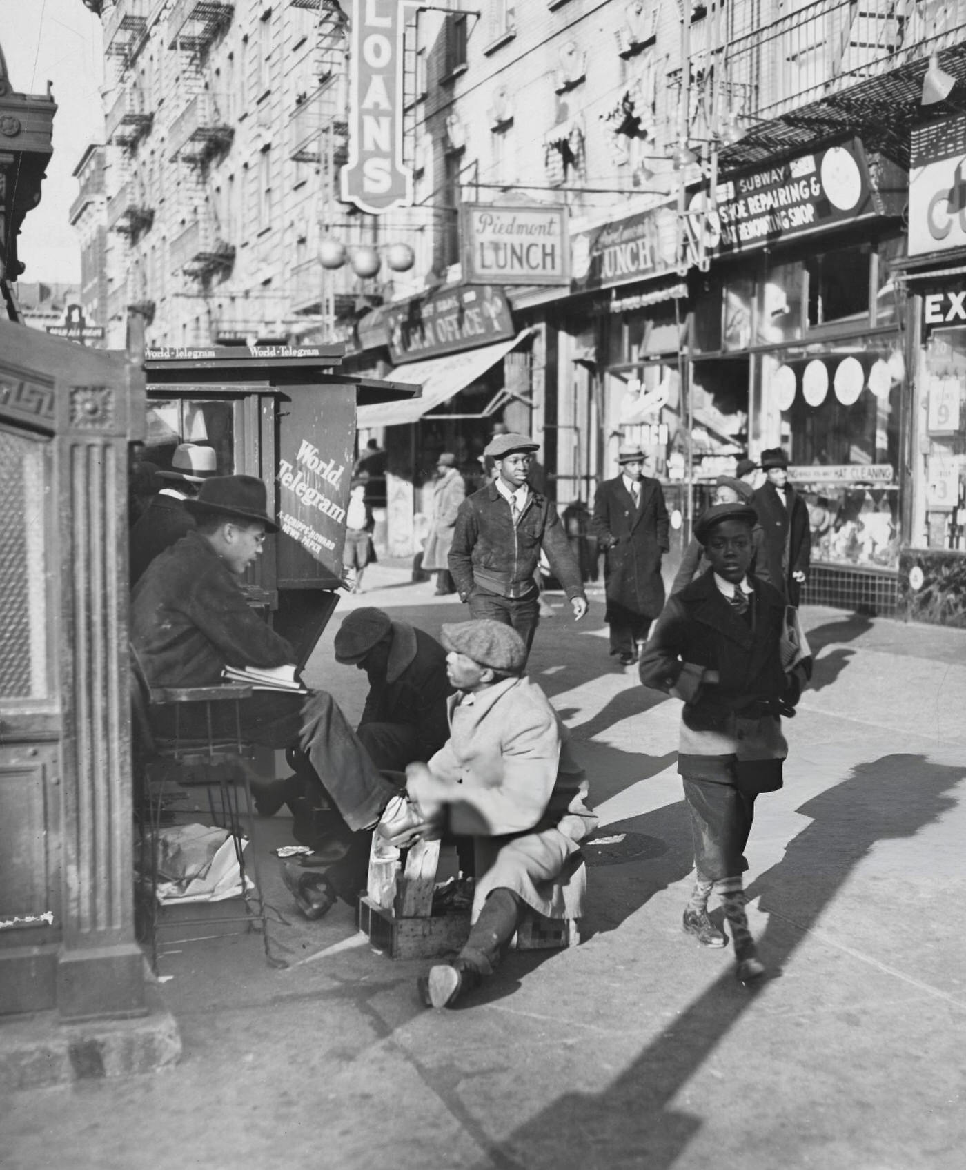 View Of Lenox Avenue, Harlem, New York At 135Th Street, Showing Businesses, Pedestrians, And A Shoe-Shine Stand, March 23, 1939.
