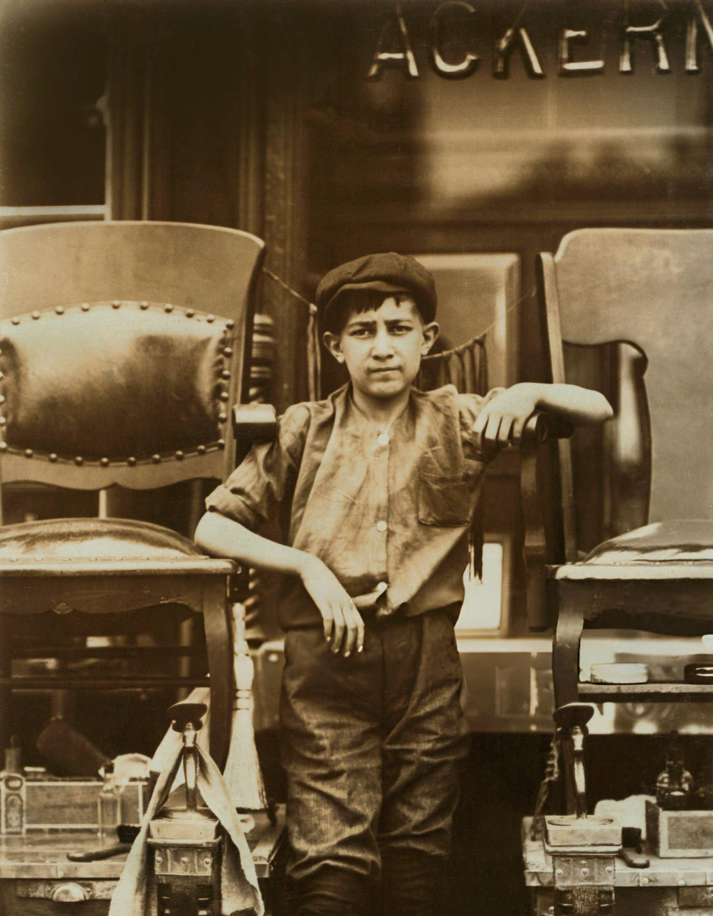 Portrait Of A Shoe Shine Boy At A Shoe Shine Stand On Greenwich Avenue, New York City, July 1910.