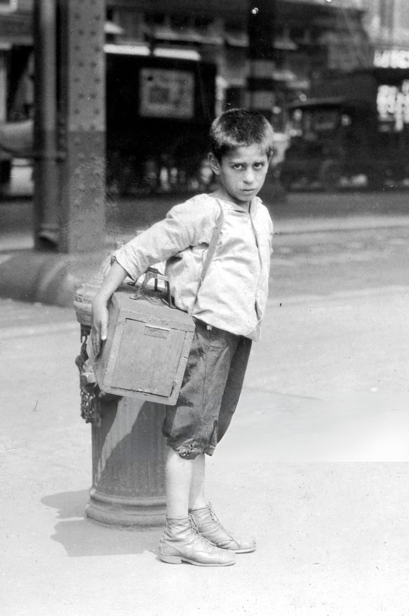 Jimmie, A Seven-Year-Old Bootblack, Working On Canal Street, New York City, July 25, 1924.