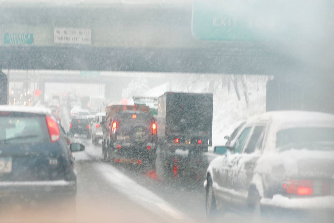 Rush Hour Traffic In Snowstorm, New York City, 2002.