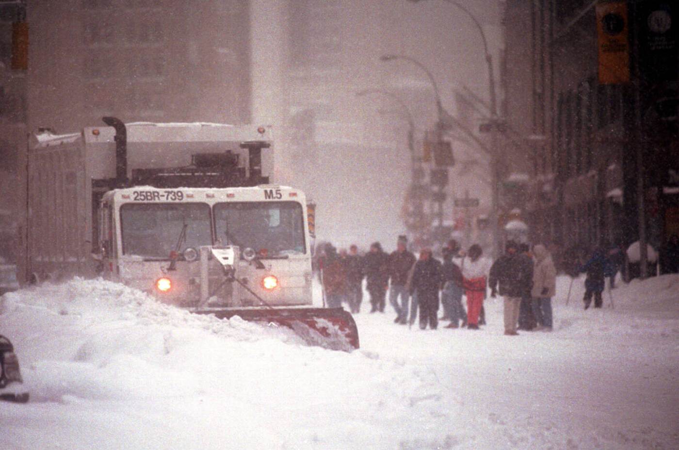 A Snowplow Clears A New York Street During A Snowstorm, 2000.