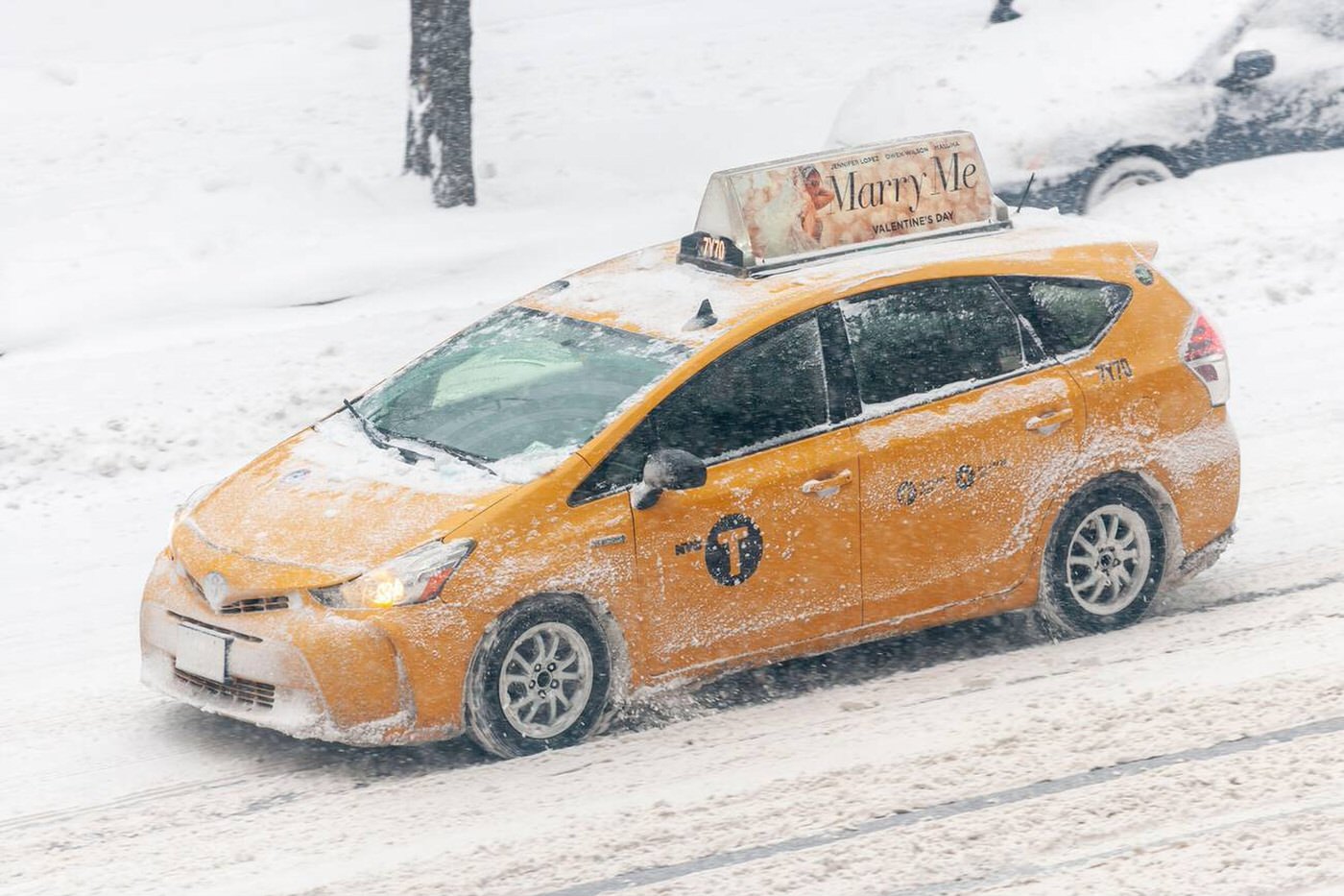 A Taxi Travels Down Ninth Avenue In Chelsea During A Nor’easter, 2022.