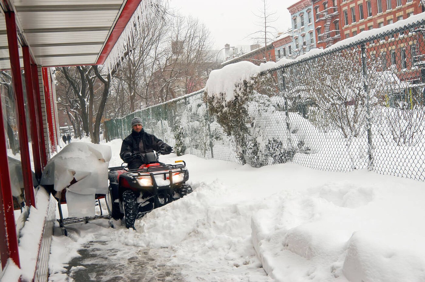 Man With A Snow Plow Clearing The Sidewalk, 2006.
