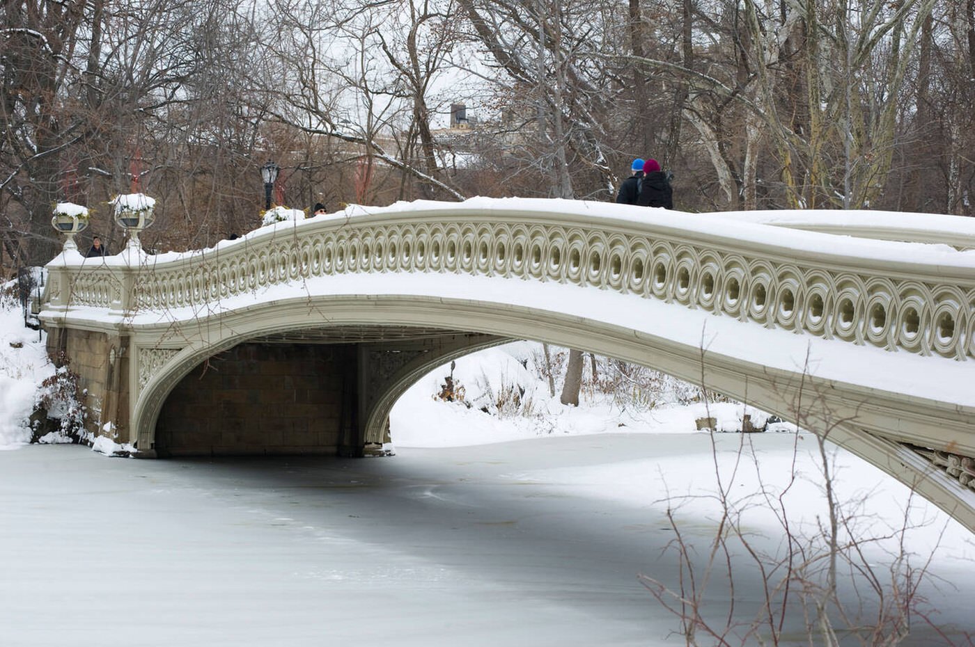 People Walking Across The Bow Bridge In Central Park After A Snowstorm, 2009.
