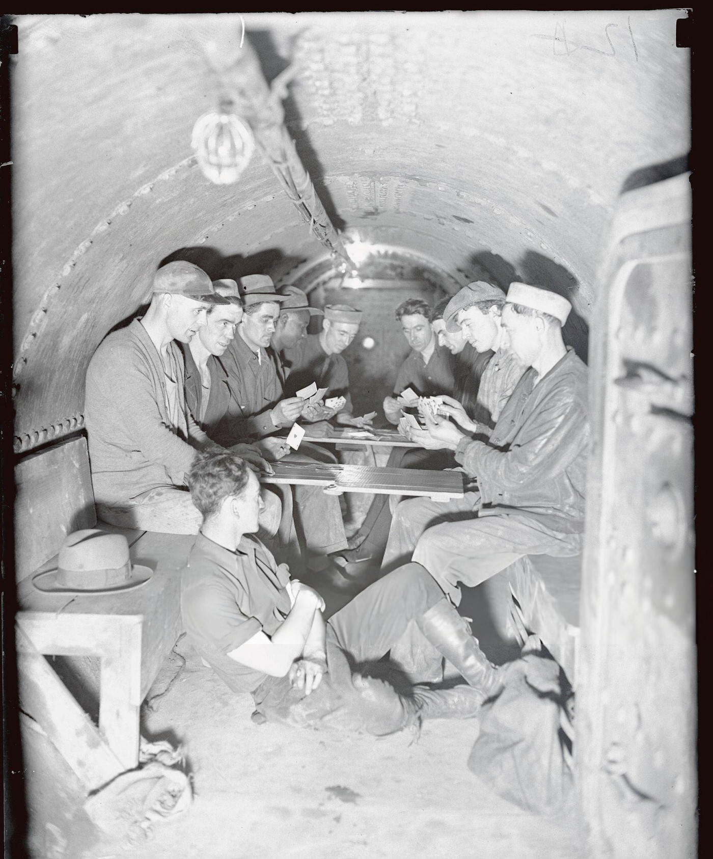 Players Take A Break In A Decompression Lock Before Emerging From The East River Subway Tubes, Where They Work Under Heavy Pressure, (Year Unspecified).