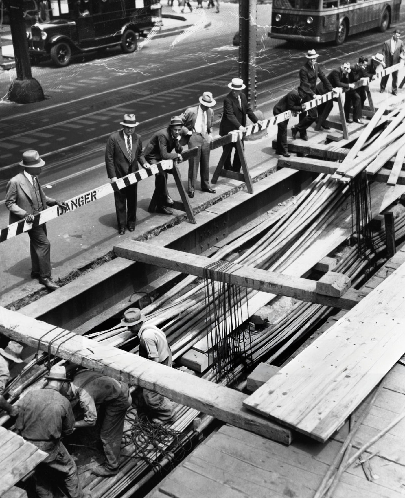 Pedestrians Lean On Barriers During The Excavation Of 6Th Avenue For The Sixth Avenue Line Of The New York Subway, June 8, 1936.