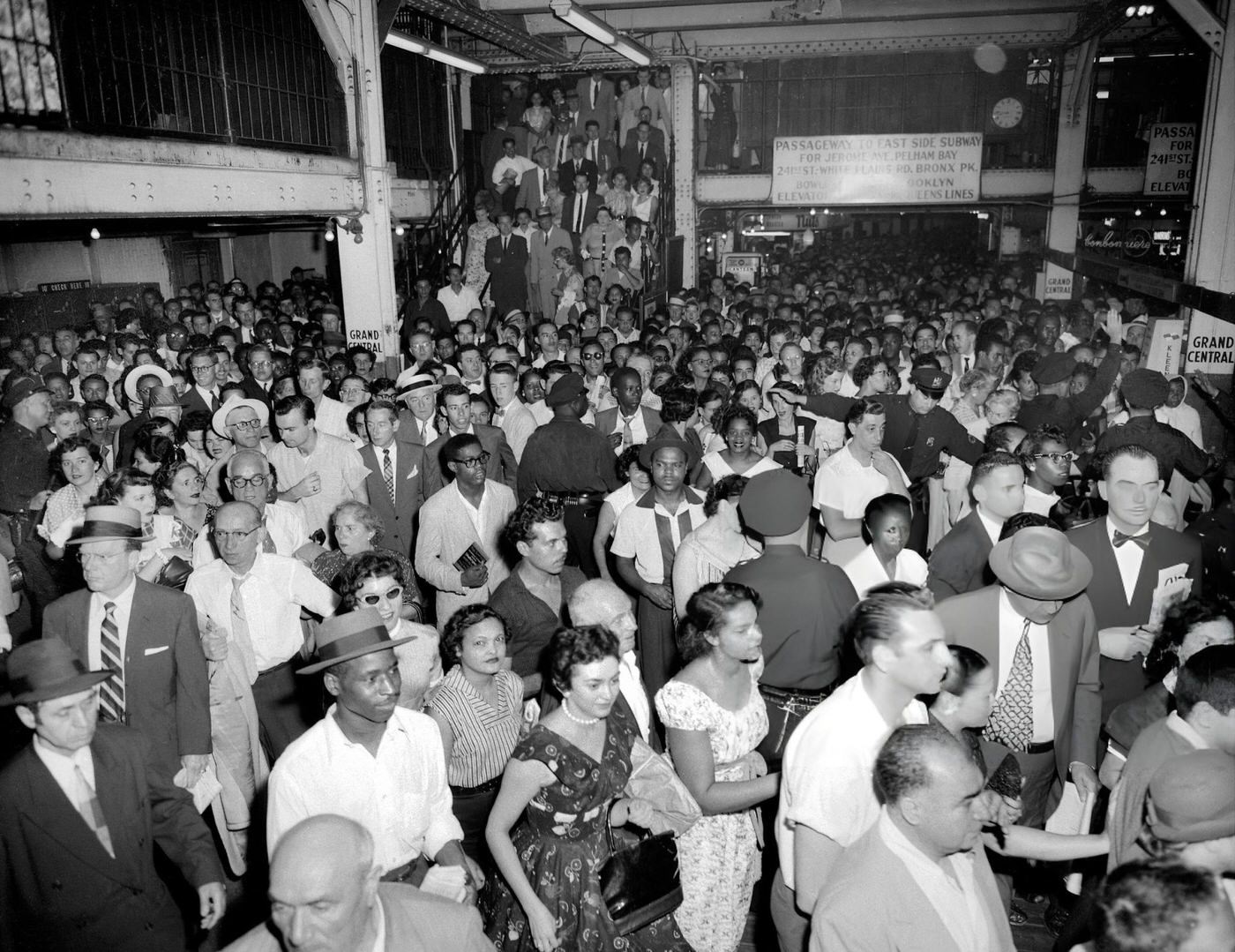 Cops Tackle A Crowd Jam At The Grand Central Subway Shuttle Terminal, With Southbound Riders Heading To The Seventh Ave. Line Due To A Wanamaker Fire, 1950S