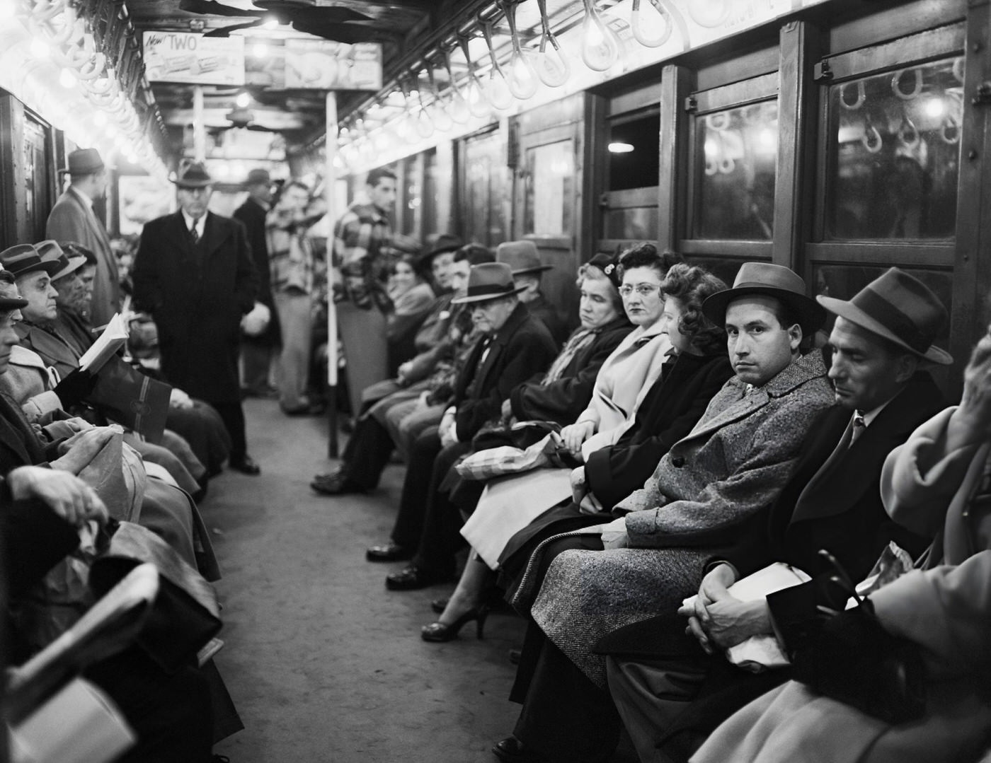 Riders On The New York Subway System Sit Without Newspapers During A Newspaper Strike.