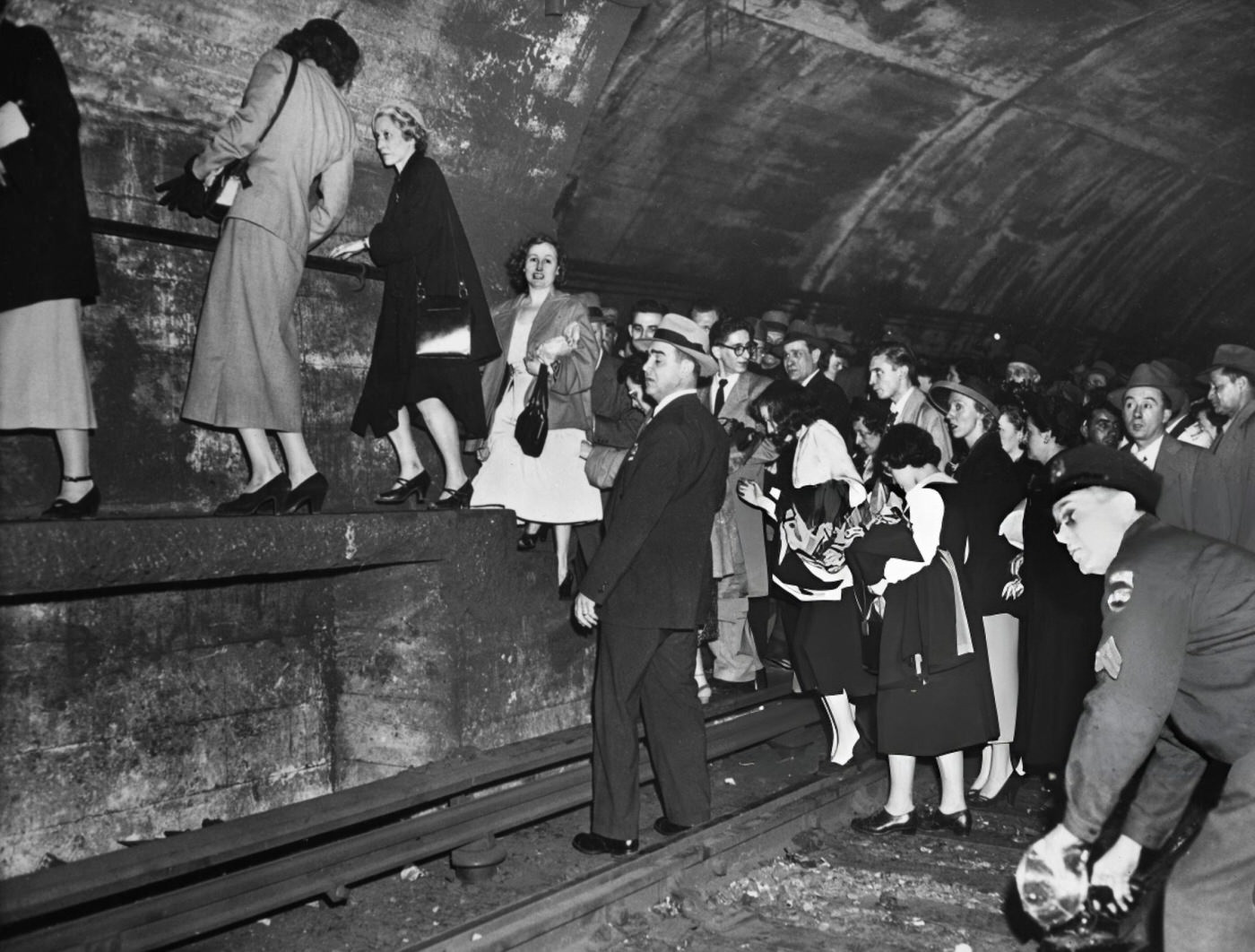 Passengers Find Their Way To Emergency Exits After A Queens-Bound Train Stalled In The East River Tunnel Of The Ind Subway System, May 13, 1950.