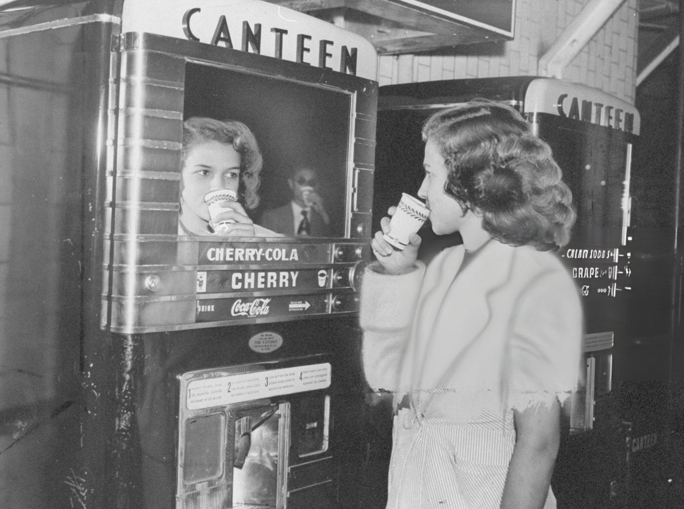 Carmen Hollert Quenches Her Thirst At A Vending Machine In Grand Central Subway Station.