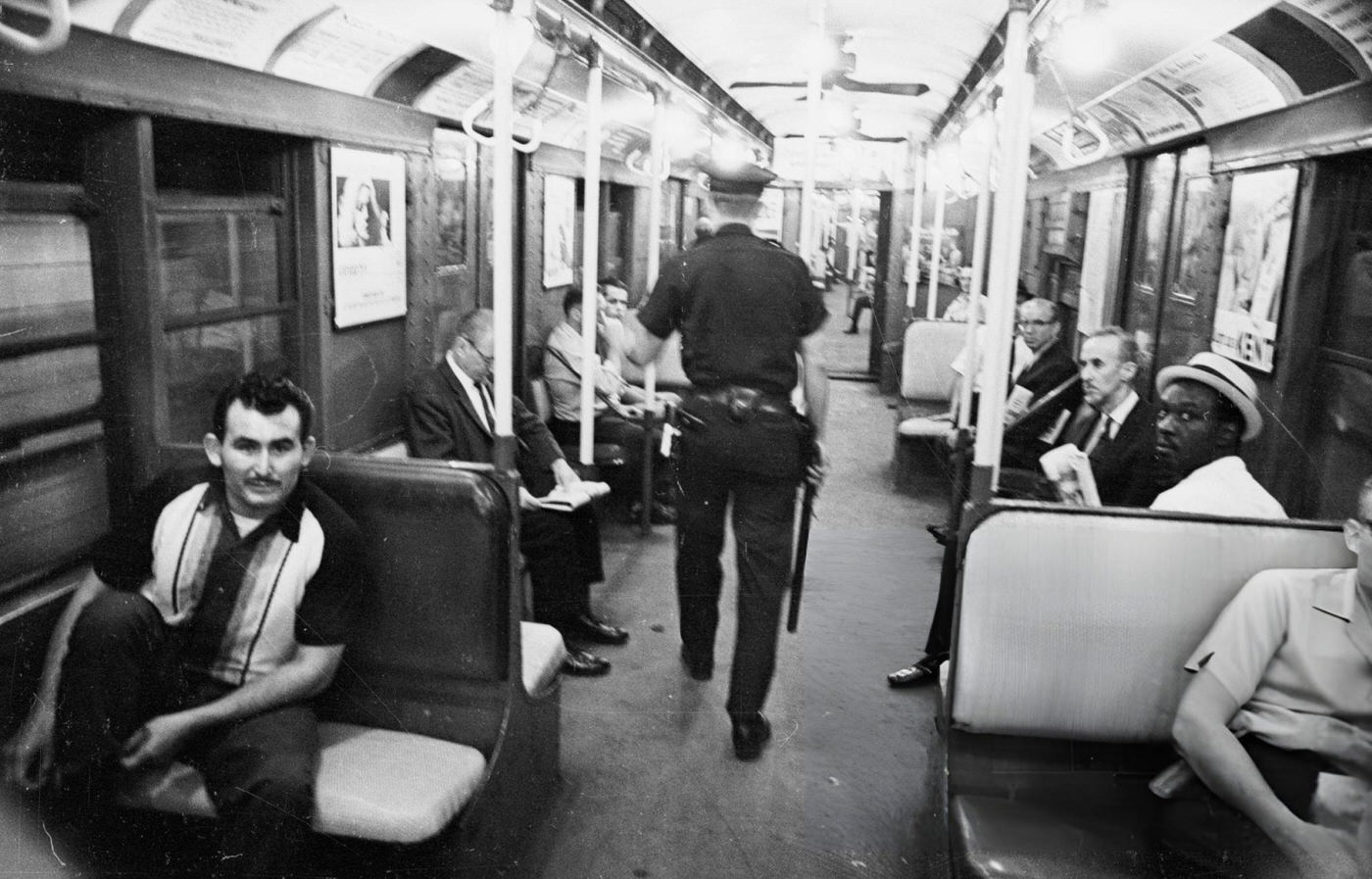 A Policeman On Patrol In The New York Subway, August 11, 1965.