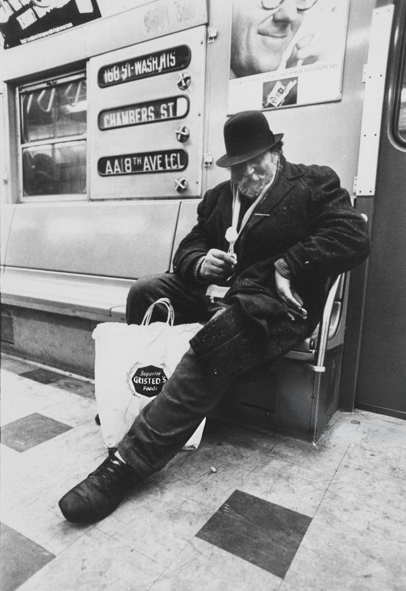 An Elderly Man Wearing A Winter Coat And Holding A Lollipop On A Subway Train, New York City, Circa 1968.