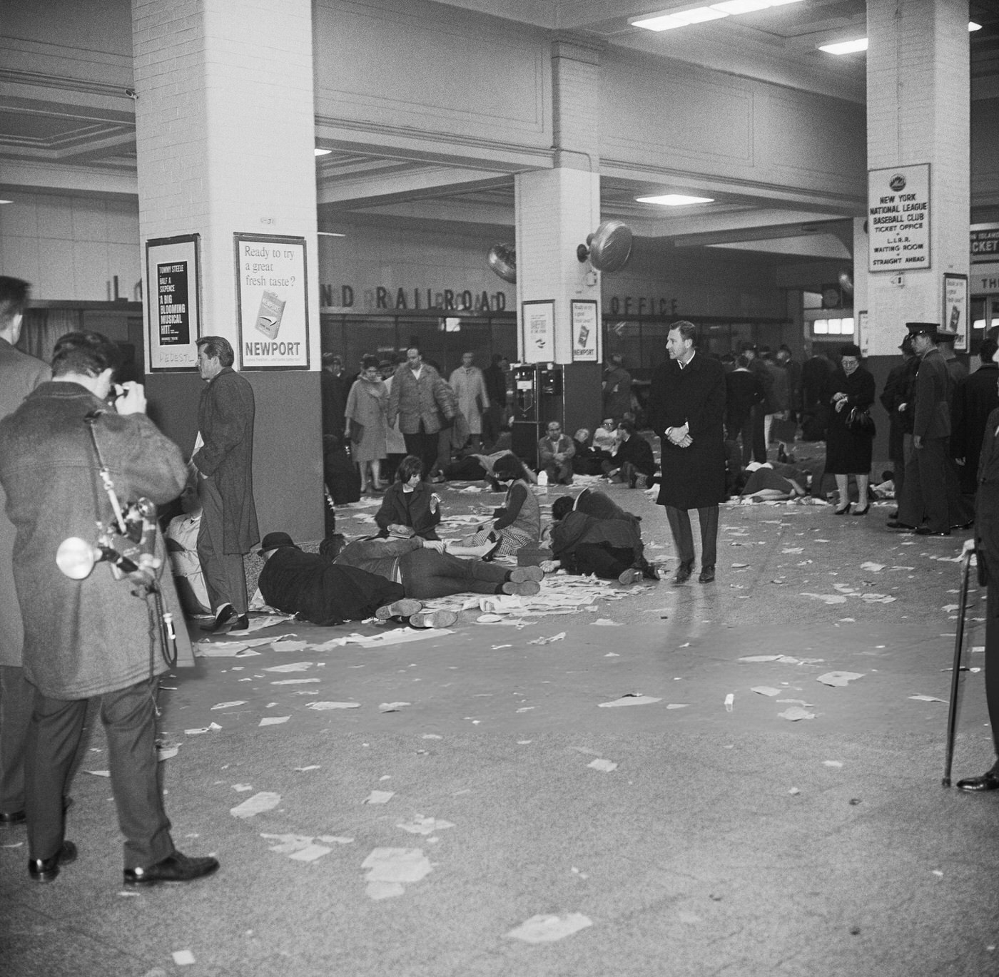 People Rest In New York'S Pennsylvania Station, November 9Th, Stranded By A Power Failure That Knocked Out Railroad And Subway Service, (Year Unspecified).