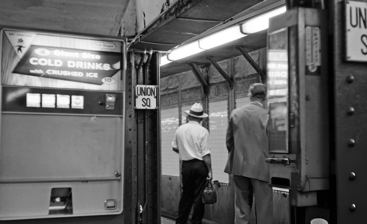 Two Men Waiting For The Train At The Union Square Subway Stoop In New York City, Circa 1965.