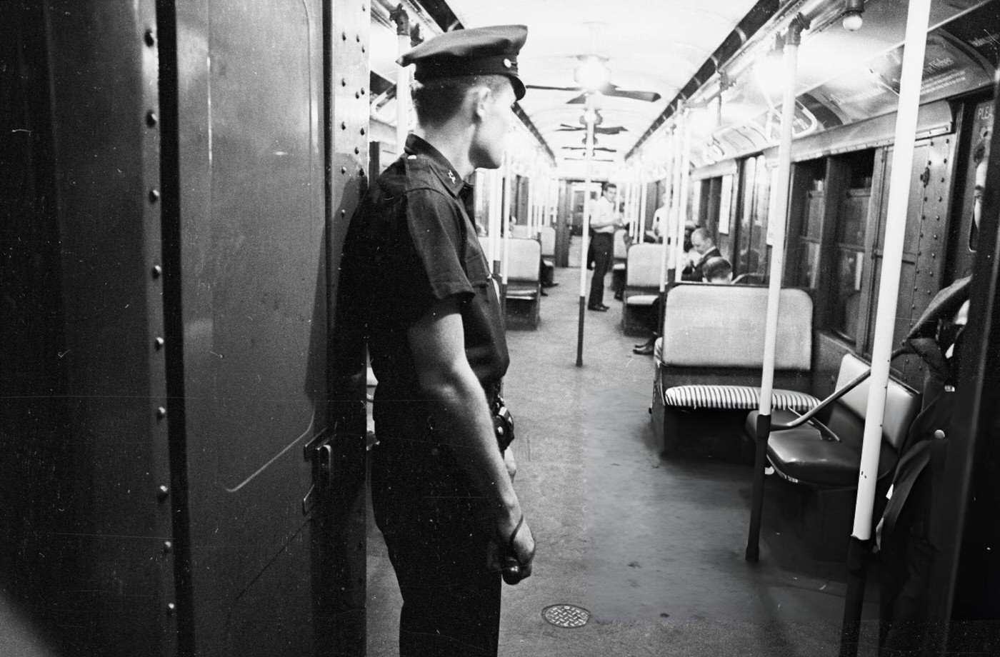 A Policeman On Patrol In The New York Subway, August 11, 1965.