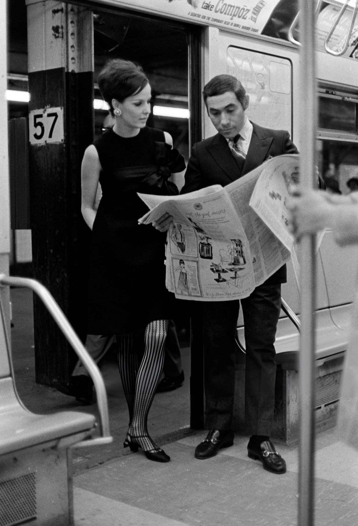Designer Chester Weinberg With A Model In A Look From His Spring Collection And Hat By Adolfo Sardina On The New York City Subway, 1968.