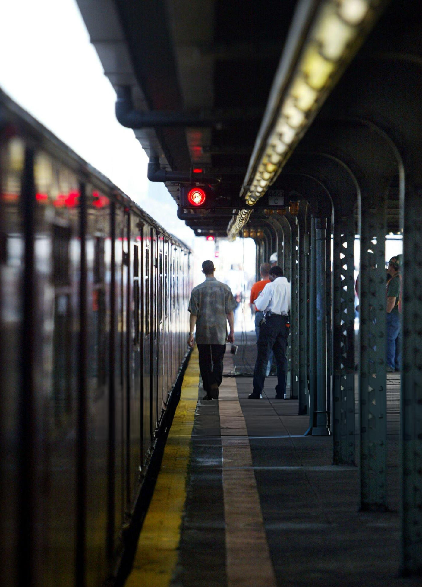 A Man Walks Next To The Last &Amp;Quot;Redbird&Amp;Quot; Subway Train After Its Final Trip From Times Square To Shea Stadium Before Being Retired, November 3, 2003.