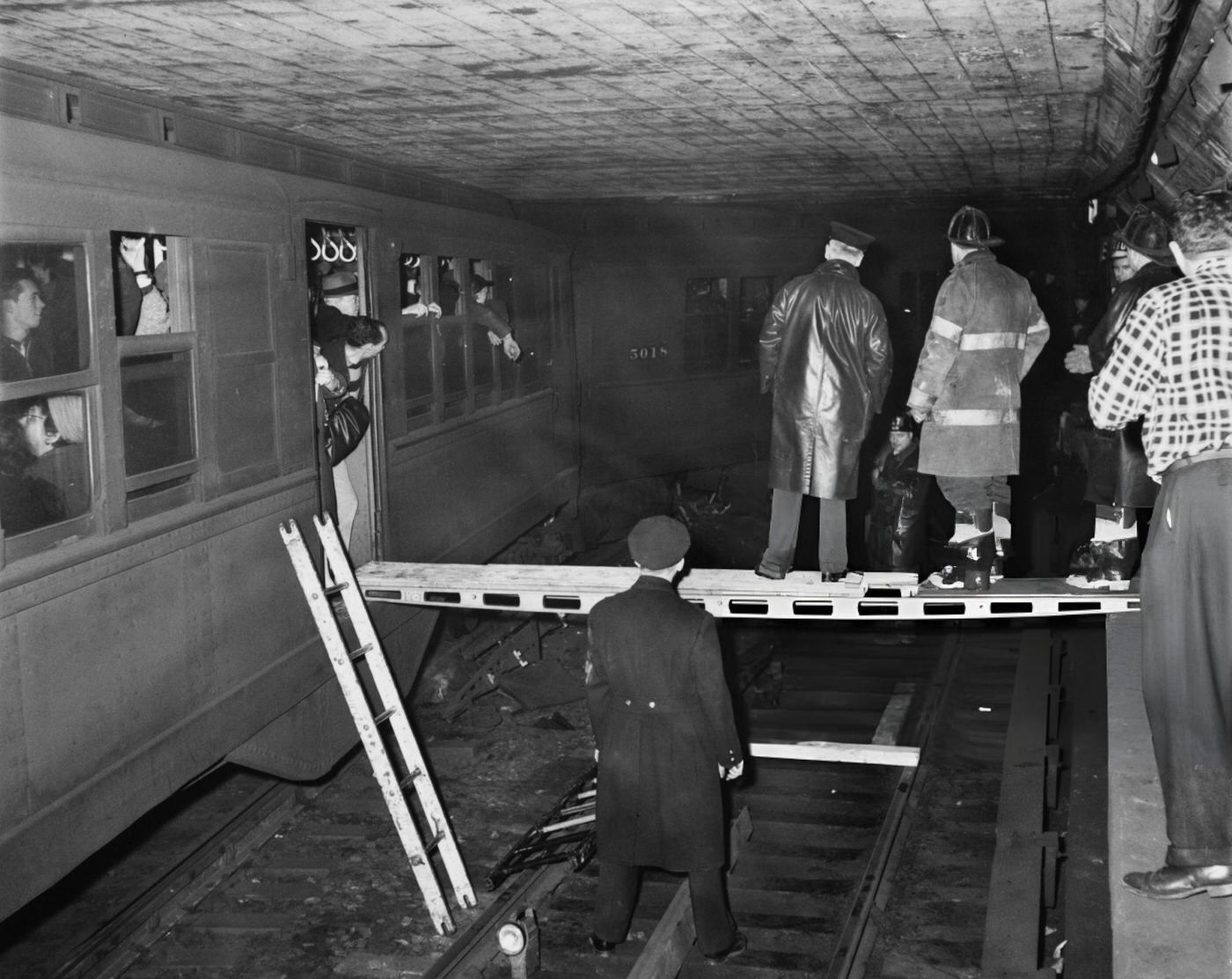 Firefighters Prepare To Evacuate Passengers Of A Derailed Irt Subway Train Near The 138Th Street Station In The Bronx, New York City, February 20, 1961.