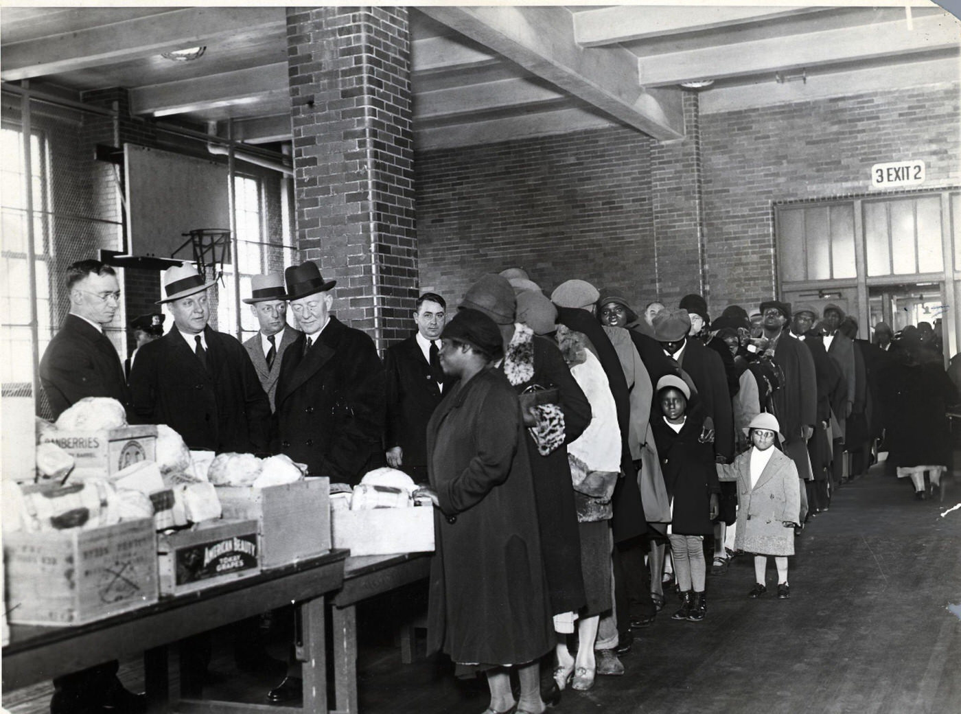 Unemployed Harlem Residents Stand In Line For Food Provided By The New York Police, 1932.