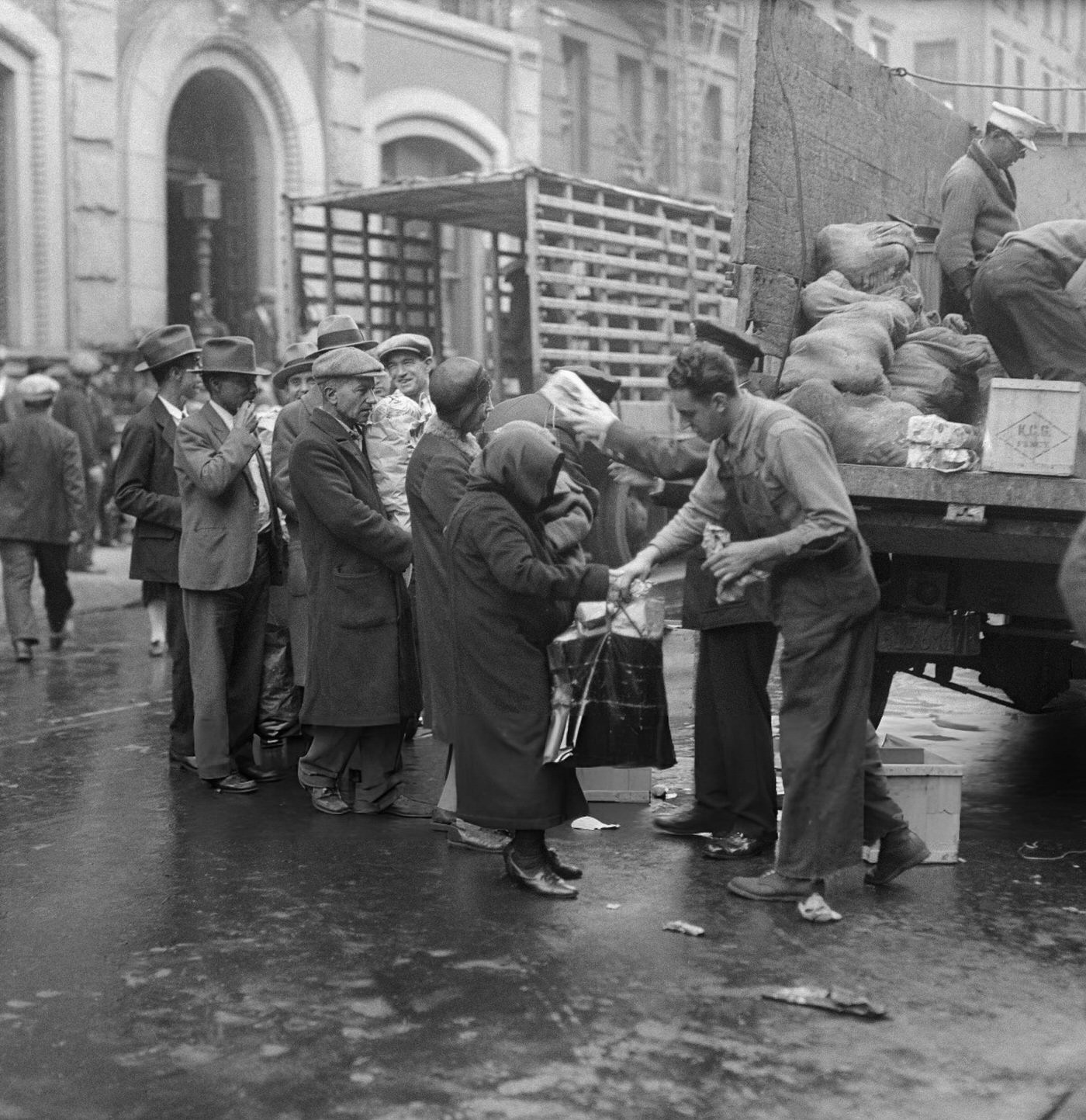 Police Distribute Food From Trucks To Needy Men And Women In New York.