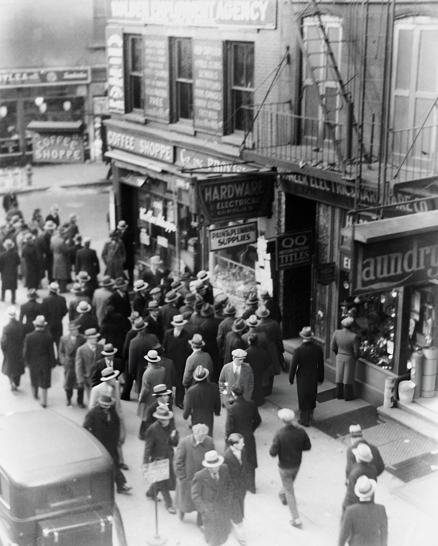 Unemployed Men Gather Outside An Employment Agency On 6Th Avenue In New York During The Great Depression, Circa 1930S.