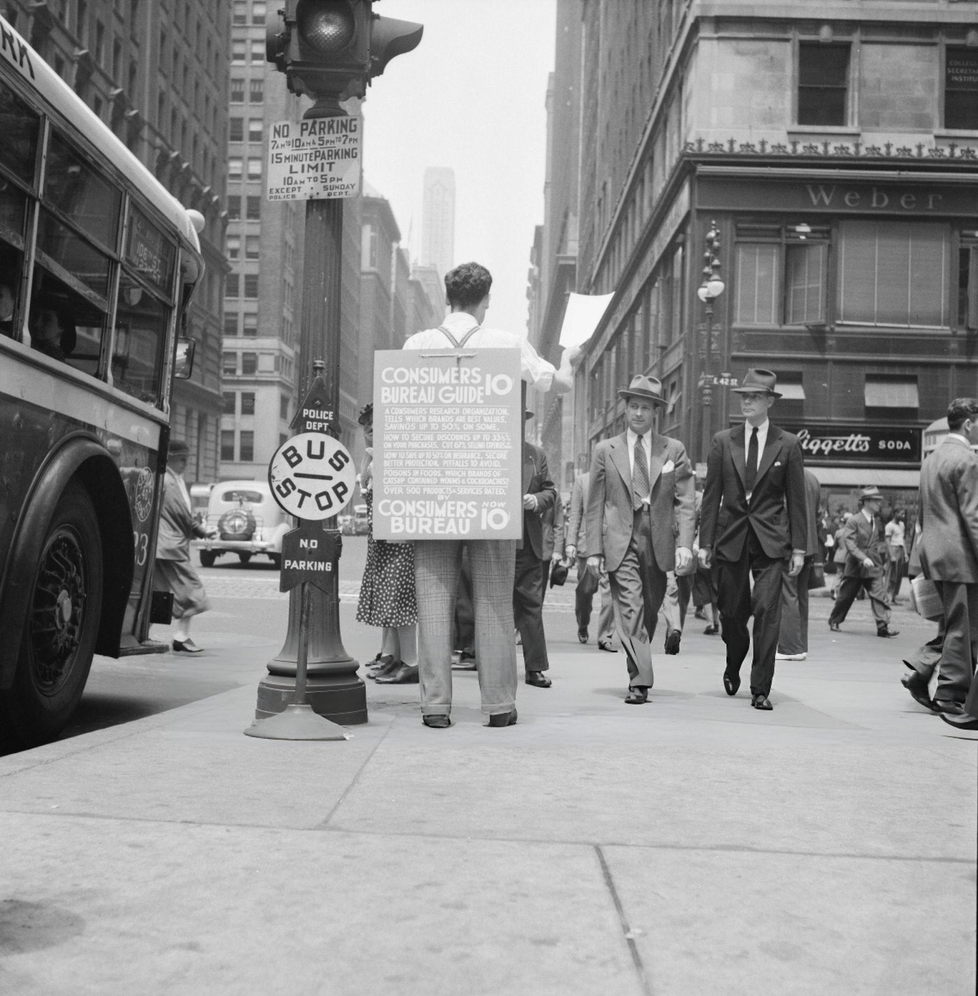 Street Hawker Selling Consumer'S Bureau Guide On 42Nd Street And Madison Avenue, New York City.