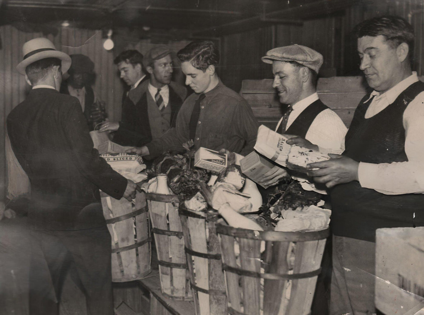 Men Load Food Baskets In New York City For Distribution During The Depression, 1932.