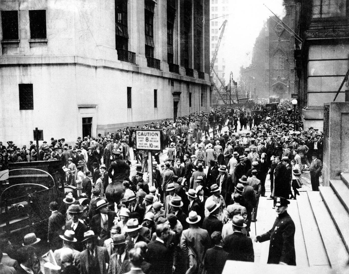 Crowds Panic In The Wall Street District Of Manhattan Due To Heavy Trading On The Stock Market In New York City On Oct. 24, 1929.