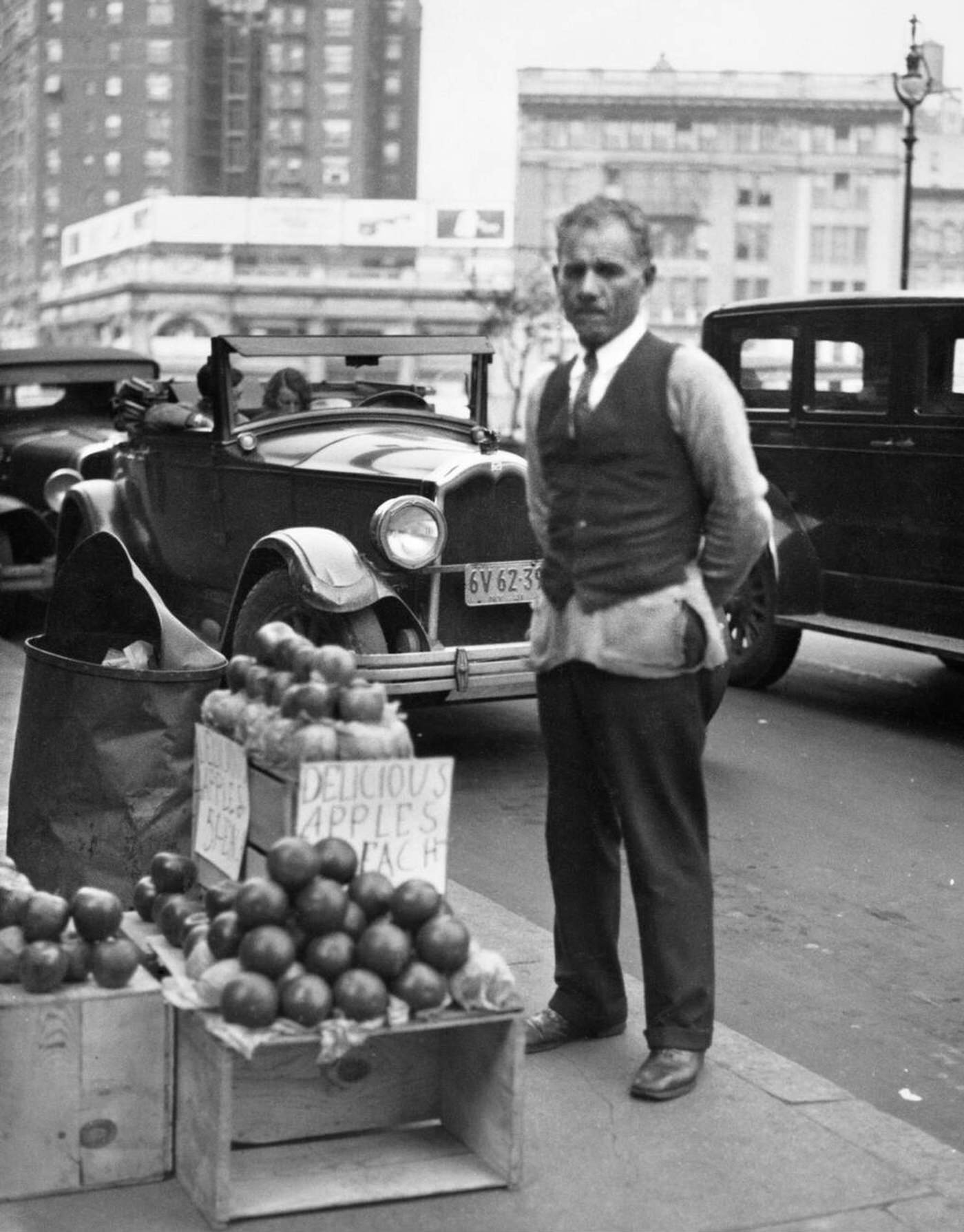 A Sidewalk Apple Vendor Man During The Great Depression, 1930S.