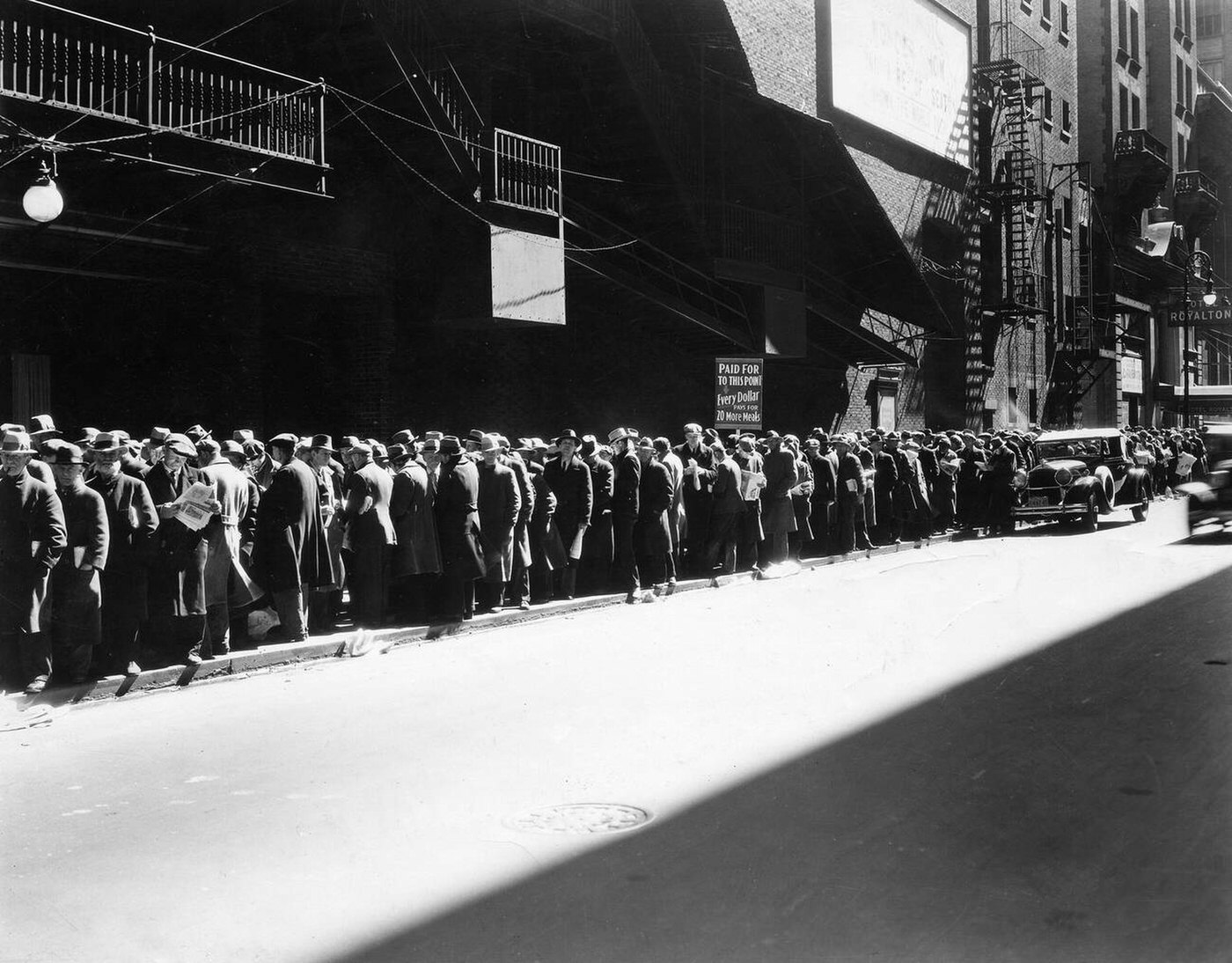 Men Standing On A Bread Line In New York City, Circa 1930.