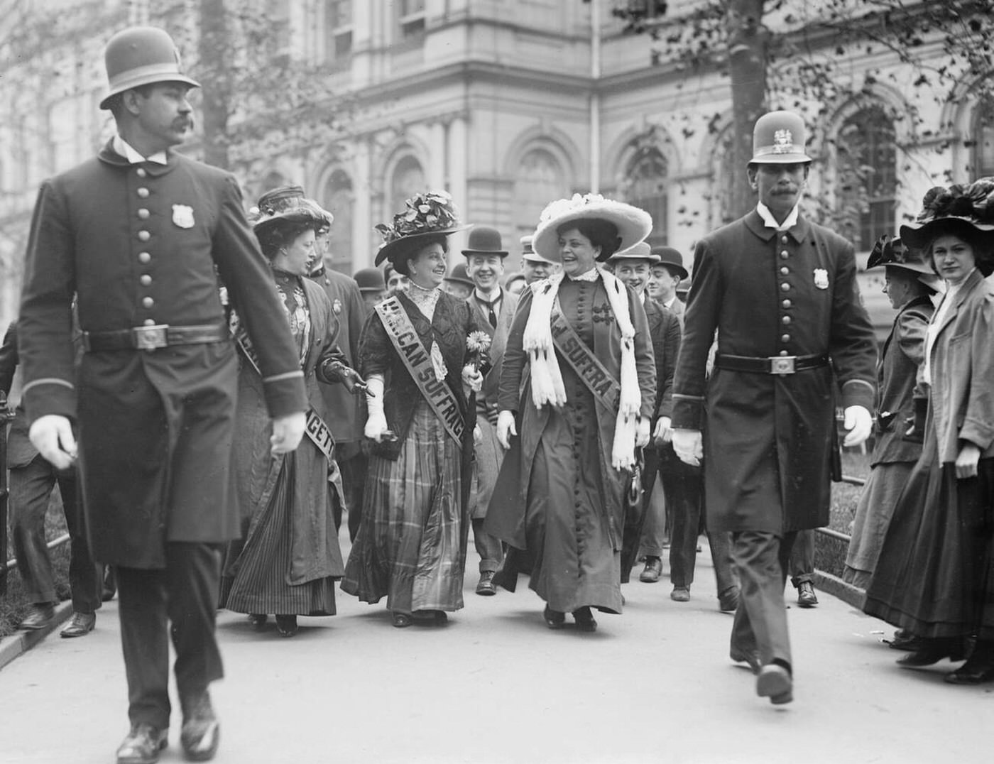 Suffragettes Leaving City Hall In New York, Accompanied By Two Policemen, 1908.
